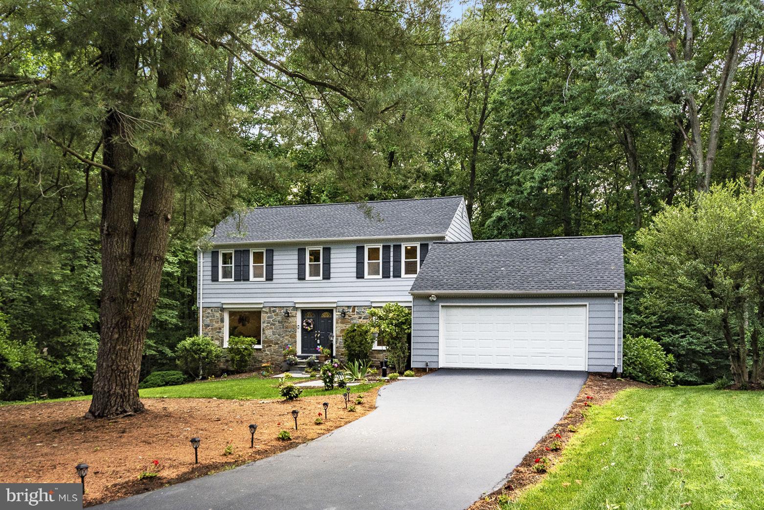 Welcome to this beautifully-upgraded, stone-front colonial situated on a peaceful, treed lot in sought-after South Reston!  Sweetbay Lane is a cul-de-sac surrounded by trees and trails and great Reston amenities.  The entire exterior was repainted (2020) and the entire interior was also repainted (2020).   Double doors open to the foyer of the home with new luxury vinyl flooring (2020).  The home features new recessed lighting throughout (2020).  The main level includes a separate living room and dining room, both which feature a large picture window overlooking the level front lawn.  The living room has glass French doors which lead to the back porch, which runs the length of the house.  The dining room has double doors opening to the family room and kitchen.  The kitchen has new luxury vinyl flooring (2020), a new refrigerator (2020), a new 5-burner gas cooktop (2020), GE double wall ovens (2018), and granite counters.  There is a granite counter with a raised ledge, which is great for casual dining, situated in between the kitchen and family room.  There is also a set of glass French doors next to the kitchen which leads to the back porch.  The family room has a wood-burning fireplace, built-in bookcases, and glass French doors leading to the back porch. The back porch can  be accessed by any of the three sets of French doors (living room, kitchen and family room).  Enjoy gorgeous views year-round from this fun space with its walls of windows! The laundry room is located off of the family room, and leads to the large garage with ample storage space.  There is also a remodeled powder room on this level (2020).  The upper level features beautifully-refinished hardwood floors in all four bedrooms. The owner's suite has two large windows overlooking the front of the home and also features a large, walk-in closet.  The owner's suite bathroom has a ceramic tiled shower, double vanity sinks, new mirrors and great natural light. The 3 additional bedrooms all have ample space, and the full hall bathroom was updated in 2020.  The fully-finished walkout lower level is perfect for an in-law suite or guests, featuring a spacious bedroom with a separate entrance, a full bathroom, living area and a huge, walk-in closet.  There is also a recreation room which leads to the two-tiered back deck and yard through glass french doors.  MORE 2020 UPGRADES! New roof. New hot water heater. The air ducts and the dryer vent line have also been cleaned.  All exterior decks have been power-washed, sanded and stained. Wood floors on the main level have been sanded and stained.  The wood floors on the back porch have been restained. The level driveway has also been re-sealed.  LOCATION: Great trails and nature surround the home and offer a fantastic retreat with easy access to the pools (Glade pool, the closest pool, has a big slide!), tennis courts, trails, lakes, playgrounds, schools and Walker Nature Center.  COMMUTING: It's also just two miles from the Wiehle Ave. Silver Line Metro and offers easy access to the Dulles Toll Road, I-495, Fairfax County Parkway and Route 7.  The Reston Town Center & Tyson's Corner are just minutes away.