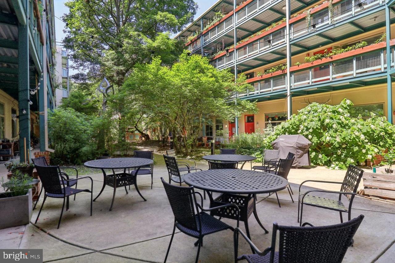 Looking for more than just a home—seeking a true sense of community? Welcome to the highly sought-after Eastern Village Cohousing Community. This vibrant, neighborly village offers far more than a place to live; it provides a warm, connected lifestyle in the heart of Silver Spring.
Discover your serene oasis in this rare and stunning one-level condo featuring 2 bedrooms, 1 bathroom, and over 833 sq. ft. of private living space. The home boasts beautiful bamboo floors and a modern kitchen equipped with granite countertops, gas cooking, and a spacious breakfast bar—perfect for any home chef.
Enjoy the outdoors in the inviting community courtyard, ideal for relaxing or entertaining. Parking is easy with on-street options and rentable public parking just steps away. The building is pet-friendly, all-age-friendly, and fully accessible.
Extensive community amenities elevate daily living. Eastern Village features a garden courtyard with a grill and fire pit, dedicated event spaces, and a rooftop garden with breathtaking park views. Indoors, you’ll find a workout room, workshop, computer room, kids’ room, game room, three guest suites, meditation room, free extra laundry rooms, library rooms, indoor bicycle storage, and multiple meeting and gathering spaces. Eco-conscious residents will appreciate the building’s solar power and geothermal heating and cooling.
Whether you’re an introvert seeking quiet green spaces or an extrovert who loves local events, this location truly offers something for everyone. Outdoor enthusiasts will love the proximity to Rock Creek Park’s hiking trails, wildlife, stables, waterside paths, and picnic areas. Meanwhile, downtown Silver Spring offers parks, community gardens, libraries, groceries, metro access, an aquatic center, fitness studios, theaters, cafés, shops, and a full calendar of live events.
Experience the perfect blend of tranquility and vibrant community living at Eastern Village. Don’t miss the chance to make this exceptional condo your home. Discover the joy of living in a place where every day feels like a retreat—schedule your showing today and step into a lifestyle that truly stands apart.