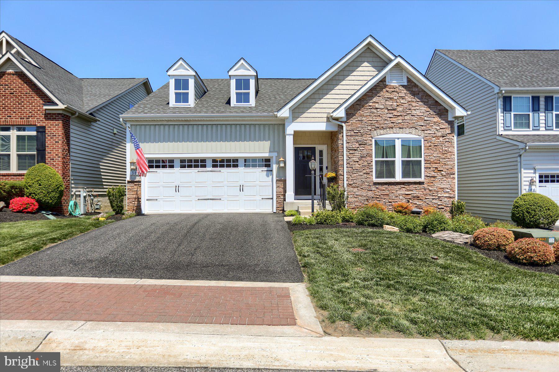 Welcome to resort-style living in the exclusive gated community of Bulle Rock in historic Havre de Grace. This beautifully maintained single-family home offers the ease of one-level living with 3 bedrooms, 3 full baths, a 2-car garage, and thoughtful upgrades throughout. A partial stone exterior, inviting curb appeal, and professionally landscaped surroundings set the tone for the exceptional lifestyle that awaits.

Step inside to discover a bright, open-concept layout that seamlessly connects the spacious living room, kitchen, and dining area into one inviting gathering space. The beautifully appointed kitchen features granite countertops, an extended island with seating, custom cabinetry with convenient lower slide-out drawers, under-cabinet lighting, and abundant prep and storage space. The new stainless steel refrigerator and gas range installed in 2024 add modern style and functionality. Hardwood flooring flows throughout the kitchen and dining area, where large windows and easy access to the outdoor space create the perfect setting for everything from quiet morning coffee to hosting family and friends. Tucked away on its own side of the home, the luxurious primary suite features a spacious walk-in closet and versatile alcove perfect for a home office, reading nook, or cozy lounge area. The elegant ensuite bath serves as a relaxing retreat with a dual sink vanity, soaking tub, and walk-in shower. On the opposite side of the main level, you’ll find two nicely-sized secondary bedrooms with generous closet space and a full bath conveniently situated between them. The main-level laundry room, located just off the garage entry, adds everyday convenience and practicality to the layout.

The current owners further enhanced the home in 2025 by partially finishing the lower level to include a stunning full bathroom with upscale modern finishes and a walk-in shower, and a large recreation room perfect for guests, hobbies, movie nights, or flexible living space. With convenient walk-up access to the backyard retreat, the lower level seamlessly extends the home’s indoor and outdoor living experience. The unfinished portion offers abundant storage and potential for future expansion.

Outside, enjoy a low-maintenance hardscape patio surrounded by mature trees and beautiful gardens, creating a peaceful setting for relaxing or entertaining. Lawn care, snow removal, and trash service are all included, allowing you to fully embrace the carefree Bulle Rock lifestyle.

Residents enjoy access to exceptional amenities including indoor and outdoor pools, a state-of-the-art fitness center, tennis and pickleball courts, bocce ball, playgrounds, walking trails, a billiard room, library, a variety of clubs and activities, and optional discounted golf memberships. Just minutes away, downtown Havre de Grace offers waterfront dining, shopping, arts, entertainment, marinas, and scenic views along the Promenade and Tydings Park. This is more than a home, it’s a lifestyle!