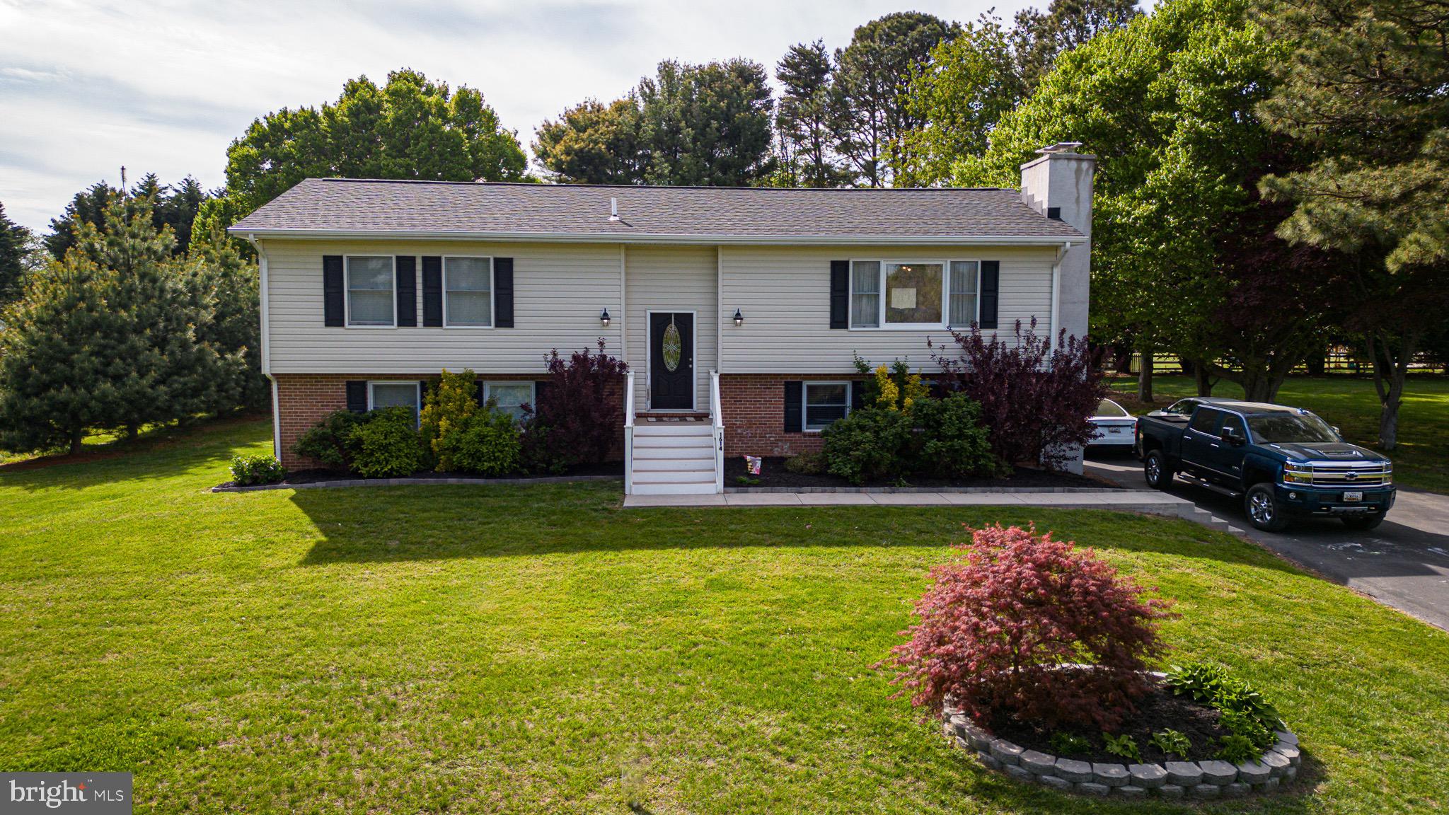 Beautifully updated, this three bed, three bath split level home offers gorgeous water views out the living room, multiple living spaces and large deck for entertaining on a nice lot in the back of the community.  Kitchen features huge center island and flows right into dedicated dining room. Primary suite and additional bedroom and bath on upper level. Lower level features a large family room with fireplace, storage closet, and third bedroom and full bath. Lower level laundry. Located in the coveted water access community of Marling Farms, you love the community amenities which includes 4 beaches or water access points, playground, fishing pier, boat ramp, ball fields and basketball court. Credit Score of 650 or higher required. Dogs considered on a case by case basis with a $250 pet deposit.