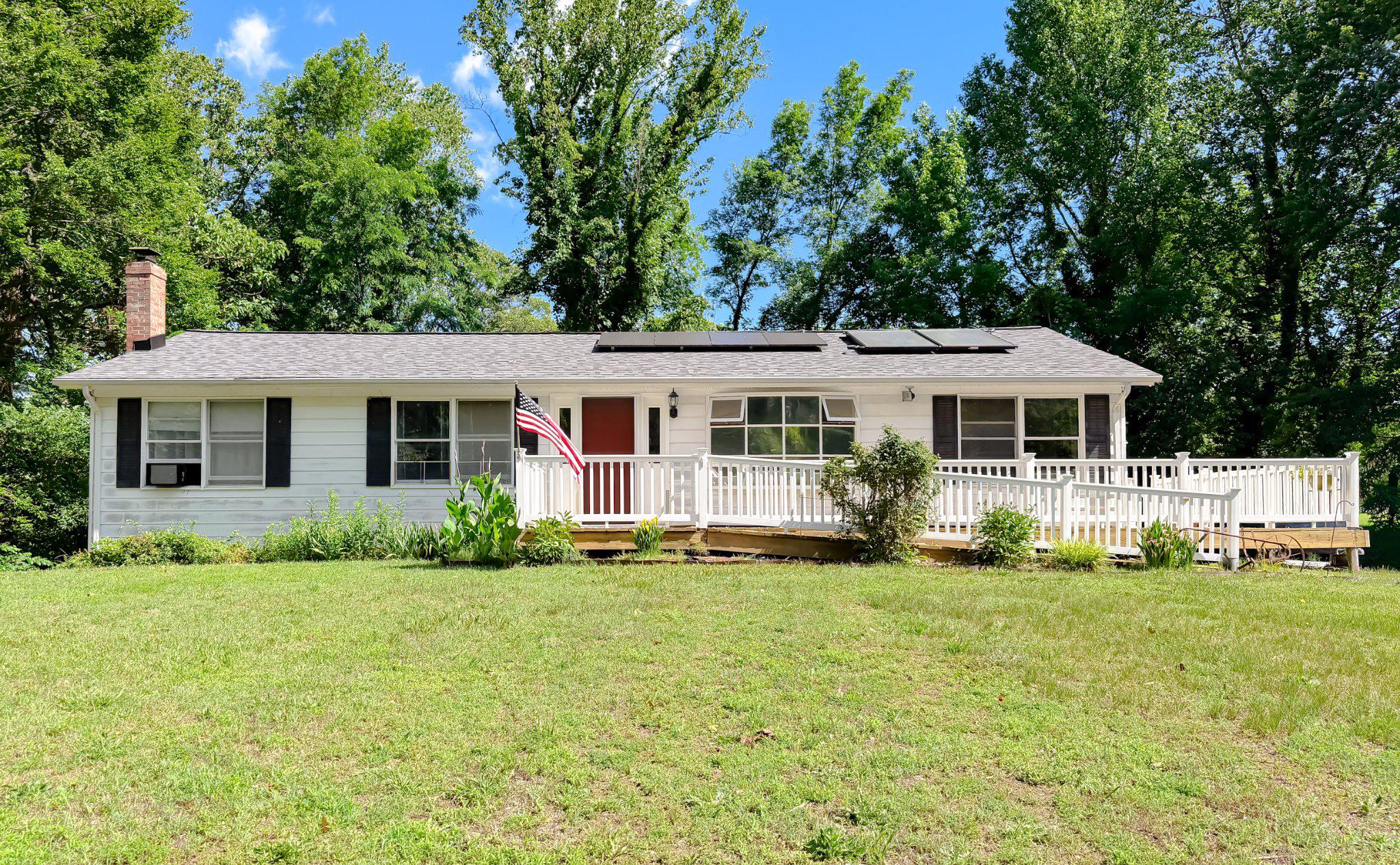 This charming ranch-style home, is located in the lovely waterfront community of Western Sbores on the Chesapeake Bay.  Built in 1977, this home offers a warm and inviting atmosphere with 1,456 sq. ft. of comfortable living space. This property offers 3 bedrooms, 2 and a half baths and sits on .85 acre of land.  Upon entering, you'll find a spacious family room that overlooks the front yard, the kitchen and dining area are just beyond the family room.  There's a large sunroom off the kitchen, the perfect space for entertaining, and nature lovers will appreciate the views of the private backyard.  Just off the sunroom, you'll find a deck, the perfect spot for steaming crabs or grilling burgers on those lazy summer days.  Down the hall, you will find three bedrooms and two full baths including a comfortable primary suite.  The unfinished, walk out basement offers a pellet stove (2023) for added warmth in addition to the baseboard heat.  You'll also find a half bath and lots of room to make it your own.  Recent updates include a new roof installed in 2025, along with solar panels (2018) that support both the homes electric and hot water systems for added energy efficiency.  There is a wheel chair accessible ramp leading to the front entrance that wraps around to the back.  

Residents of Western Shores may enjoy water privileges including the community beach access and a pavilion/picnic area for a small annual fee of $75. per year. This peaceful community offers the perfect blend of privacy, nature and Chesapeake Bay lifestyle living. The property includes a shed for extra storage and a long driveway for easy parking for your car, boat and/or jet skiis.  Located less than a 1/2 mile from the beautiful Chesapeake Bay, this home offers water access for boating and fishing enthusiasts. The community is enriched with parks, excellent schools, and convenient public services, making it a wonderful place to call home.