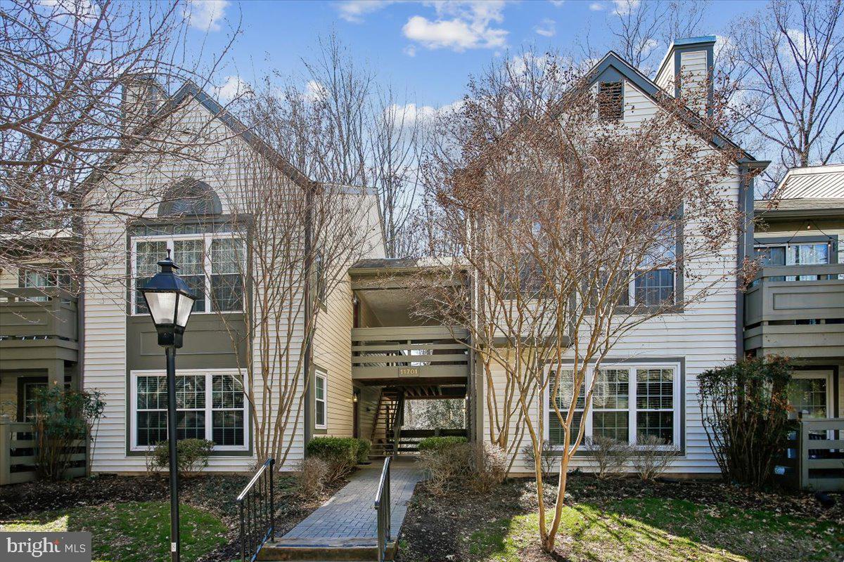 Seller is offering $5000 credit to the new homeowner!! Lovely 2 bedroom, 2 bath unit tucked away in a private park-like setting overlooking forest and trails. The kitchen has been remodeled with brand new cabinets, 2-yr new stainless steel appliances, granite countertops and recessed lighting. Cozy family room with woodburning fireplace and access to an awesome rear patio. Hardwood flooring throughout. The primary suite offers a large walk-in closet, a sliding glass door to the patio, and a renovated primary bath. The newer full size washer and dryer are located in the 2nd remodeled bathroom. Freshly painted throughout. Enjoy everything Reston has to offer from the 55 miles of trails, pools, tennis and lakes, just minutes to Reston Town Center, South Lakes Shopping Center and the Silver Line metro.