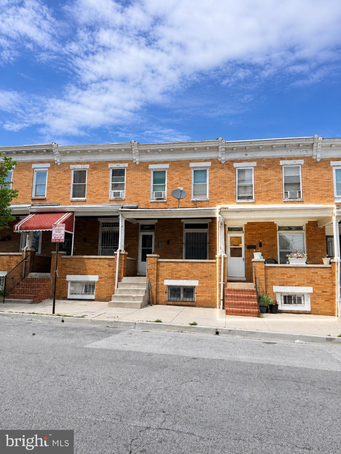 Located in the historic Berea community, this solid brick row home offers timeless character, functional updates, and exceptional potential for both homeowners and investors alike. Featuring hardwood floors throughout, high ceilings, skylights, and vinyl replacement windows, the home is filled with natural light and classic charm.

The spacious kitchen provides ample room for cooking, gathering, and future customization, while the finished lower level adds valuable flexible living space complete with a full bath featuring a vintage claw foot tub and radiant heating system. Additional highlights include updated electrical, ceiling fans, and window AC units for year-round comfort.

Whether you're a first-time buyer looking to build equity or an investor seeking a strong addition to your rental portfolio, this property presents an outstanding opportunity in a convenient Baltimore location. Sold AS-IS.