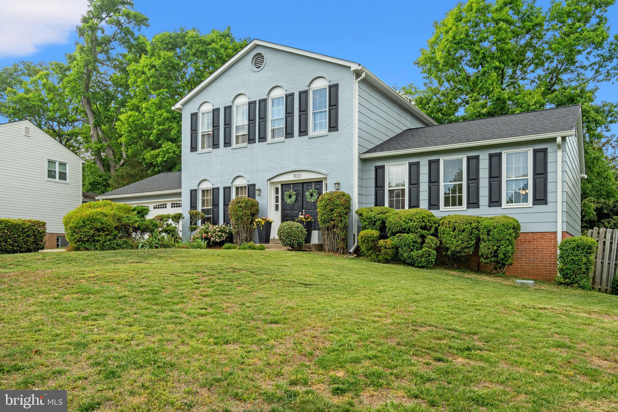 Nestled on a rarely available street in sought-after Mason Hill, this beautiful Van Metre colonial offers exceptional indoor and outdoor living on a stunning 15,433 sq ft lot backing to trees. Designed for entertaining and everyday enjoyment, the private rear yard features an in-ground pool, expansive deck, landscaped grounds, and plenty of space for summer barbecues, lawn games, and outdoor gatherings.
This spacious 5-bedroom, 3.5-bath home welcomes you with a gracious entry foyer, powder room, and hall closet. A main-level bedroom currently functions as a private home office, offering flexibility for guests or multi-generational living. The circular flow and open floor plan create versatile living spaces ideal for both casual living and entertaining.  The large eat-in kitchen opens to a warm and inviting family room with a wood-burning fireplace and french doors leading to the deck overlooking the pool and wooded backdrop. Upstairs, you’ll find four spacious bedrooms and two full baths, including a generous primary suite.
The walk-out lower level is designed for entertaining with direct pool access, a full bath, bar area, and abundant storage space perfect for pool equipment, toys, and seasonal items. Additional features include a two-car garage, irrigation system, and fenced rear yard—your own private escape.  Sherwood Hall Lane is close by and your quick jump to The parkway or Rout 1. Convenient to parks, grocery shopping, convenience stores, restaurants and more!! Stroll to parks or bike on the Mount Vernon Bike Trail. A fews miles farther is the Village Hardware, Variety Store, Pastry shop and so much more! Easy commuting to  Old Town, Pentagon, DC and Ft. Belvoir.  Huntington Metro is approx 3 miles, National Airport 8 miles.