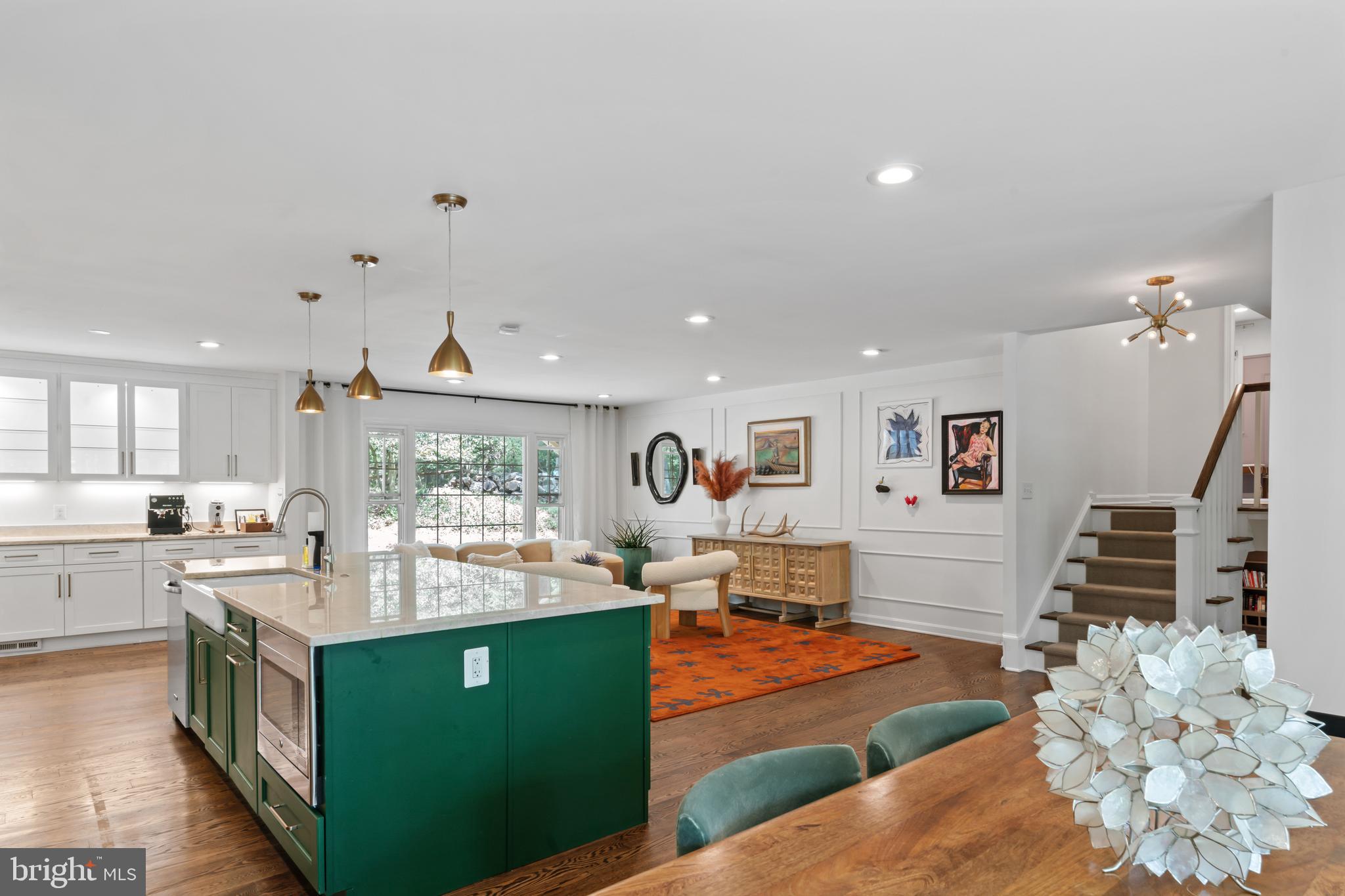 Offer dateline Tuesday at 12 pm. Beautifully updated and full of character, this three-level colonial combines timeless charm with smart modern upgrades. The open-concept main level features wide-plank white oak flooring (2017), and a fully renovated kitchen (2017) with stainless steel appliances, double ovens, quartzite countertops, and a natural gas cooktop-perfect for everyday living and entertaining. Upstairs, both bathrooms were updated in 2017 with elegant marble tile floors, countertops, and showers, while the primary suite includes custom built-in wardrobes added in 2022. The family room features custom built-ins (2018) and a cozy gas fireplace insert (2018).

A spacious unfinished basement offers ample storage and future expansion potential, and the sunroom—painted in 2022 and equipped with its own heat pump for heating and cooling (2020) opens to a custom flagstone patio (2017) and peaceful backyard setting. Additional updates include a newly replaced roof (2024), updated windows (2017), sump pump (2022), whole-house dehumidifier (2020), radon mitigation system (2019), and an electric water heater (2018), ensuring comfort and peace of mind.

Tucked away on a quiet lane in a low-traffic neighborhood, the home is just across the street from scenic wooded trails and within walking distance to Glade Pool, the Walker Nature Center, and newly opened clay tennis courts (2025), now available for public use. Be sure to check the Documents section for a full list of thoughtful updates—this home has been lovingly maintained and carefully improved over the years.