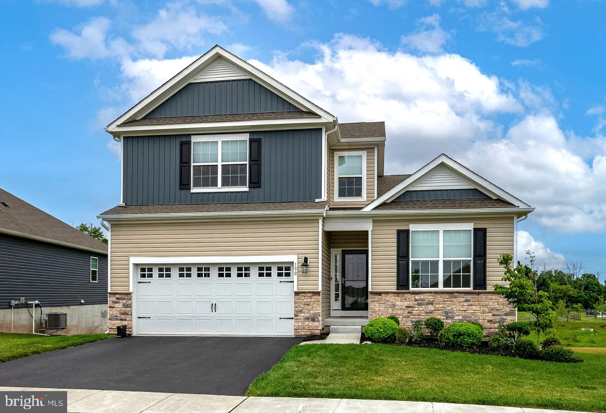 **This is a 55+ community. However an 80/20 rules exists and this home may be sold to people under 55. Age restriction for children is 19 years or older.**

Exceptional design & refined finishes come together in this beautifully appointed home in the highly desirable community of Pottsgrove Hunt. Offering 2,500 square feet of finished living space, including a professionally finished walk-out lower level, this 4-bedroom, 3-bath residence combines sophisticated style with everyday comfort.

The sun-filled open floor plan is anchored by a stunning white gourmet kitchen featuring quartz countertops, premium soft-close cabinetry, stainless steel appliances, and oversized center island. The kitchen flows seamlessly into the spacious great room and dining area, creating an ideal setting for both elegant entertaining and relaxed everyday living. Sliding doors lead to a new covered deck that overlooks the walking path and wooded area for additional privacy.

The private primary suite serves as a peaceful retreat with a generous walk-in closet and a beautifully appointed en-suite bath with double vanity, tile flooring, and walk-in shower. An additional bedroom, full bath, and laundry round out the first floor. Enjoy upgraded luxury vinyl plank, carpet, and tile flooring.

Thoughtfully designed upstairs guest bedrooms and the third full bath provide flexible living spaces & endless possibilities for visitors, a home office, or hobby room. The finished walk-out lower level offers exceptional versatility with an expansive recreation area, and 3 large storage areas.

Step outside to enjoy the tranquility of the surrounding landscape or embrace the exceptional lifestyle Pottsgrove Hunt is known for. Residents enjoy a beautifully maintained clubhouse, fitness center, pickleball and tennis courts, bocce, walking trails, and a full calendar of social activities, all while benefiting from low-maintenance living with lawn care, snow removal, and trash service included.

Ideally situated just minutes from shopping, dining, major commuter routes, and everyday conveniences, this exceptional home offers the perfect balance of luxury, comfort, and convenience. Meticulously maintained and better than new, this is a rare opportunity to enjoy upscale active-adult living without compromise.