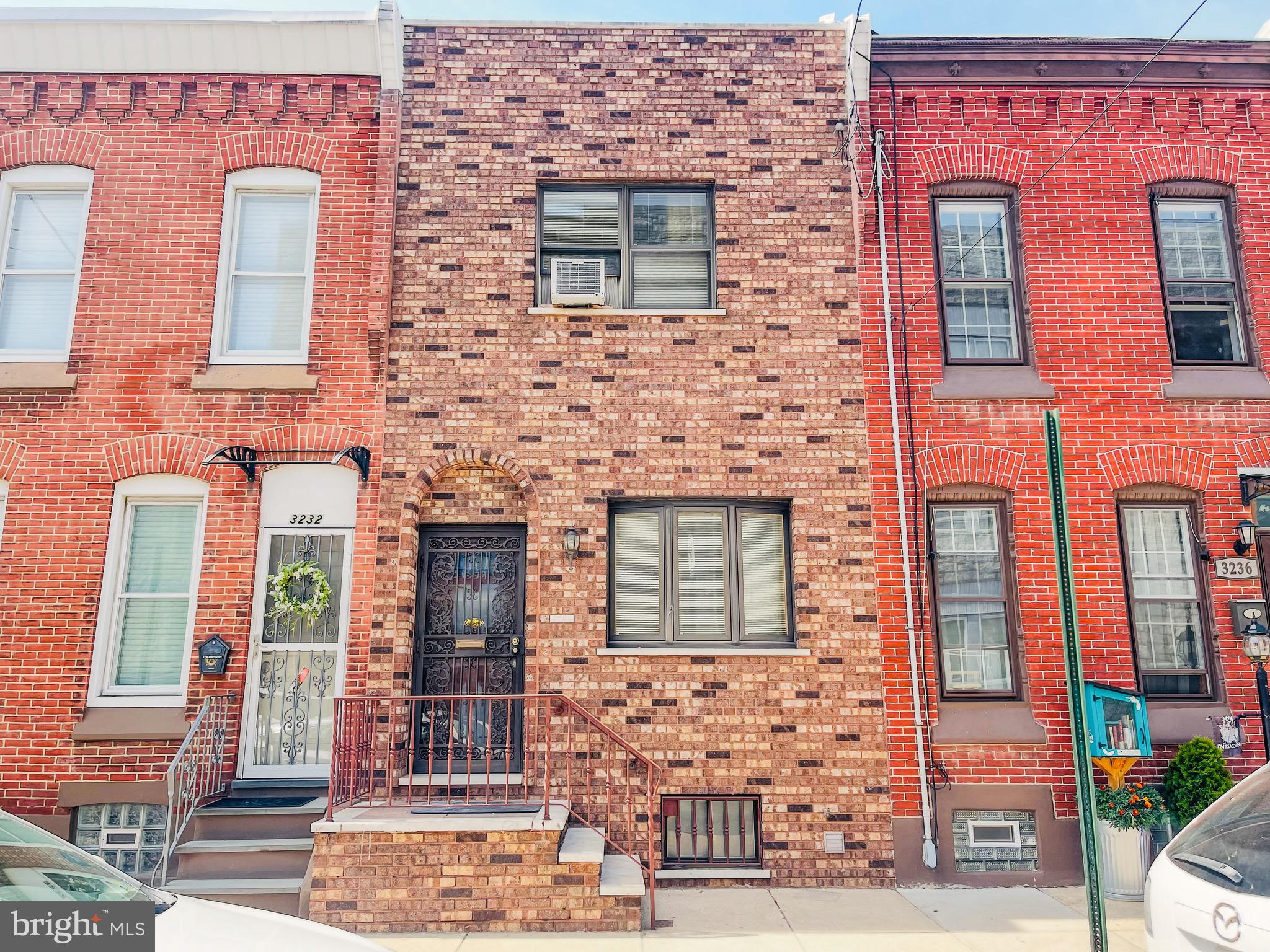 Interior photos coming soon!  Welcome to 3234 E Thompson Street!  This home is beautiful with a gorgeous newer brick front, brand new wall-to-wall carpeting, freshly painted and a 2nd full bath in the basement!  Don't miss out on the best value in very desirable PORT RICHMOND! Located just 3 blocks from I-95, this home has been well cared for in the same family for generations!  With its marble window sills and thresholds and a HUGE living room with a Pella bay window, not to mention a large rear yard completely fenced in.  The bedrooms are nice sized. There is a huge basement with lots of possibilities with a large laundry area and full bath! Home has great wrought-iron security doors and a brand new steel front entrance door. Priced to sell, make your appointment while it is still available!