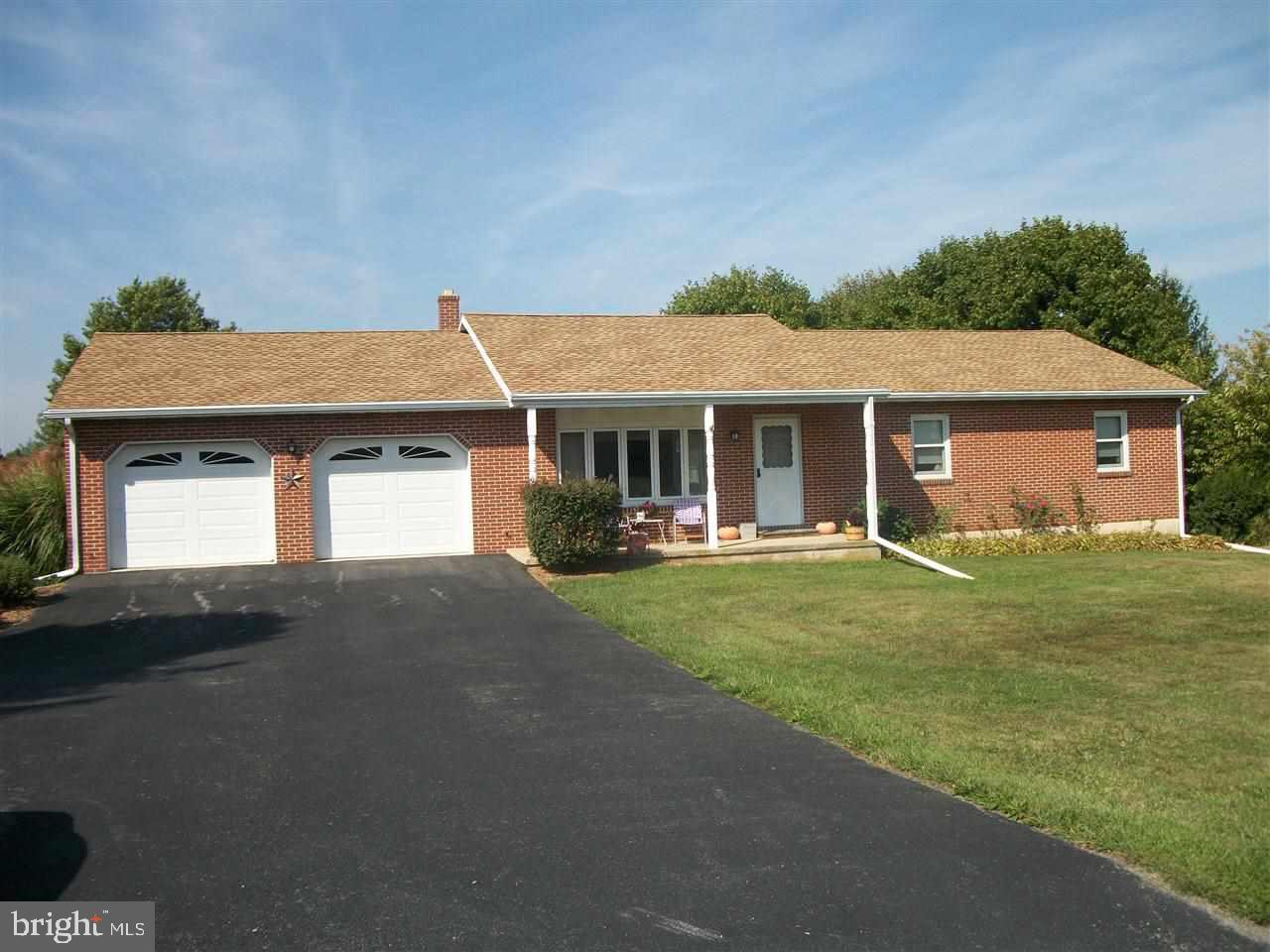 Fantastic 1.25 acre lot w/privacy, garden spot & backs up to more rolling acres w/a view. Wood floors throughout, updated KIT & BA, huge attached heated garage. 1st floor LDR. Everything upgraded & well maintained. Too many features to list, refer to the special features list. Take a look & appreciate the quality of this one owner home.