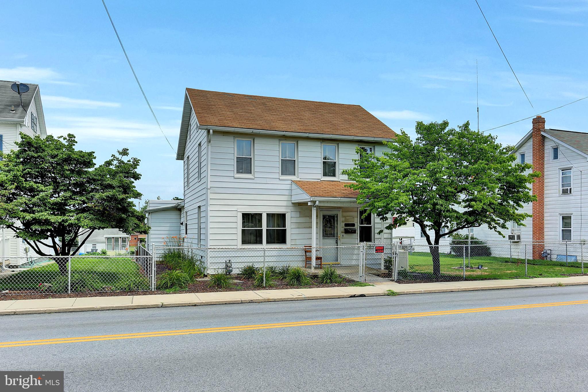 CONEWAGO VALLEY SCHOOL DISTRICT and ready to move in!  This affordable and adorable country home has all the charm of the 1800's, yet so modernized and very well kept!  The kitchen is spacious enough for a table or island, adorned with beautiful woodwork for that warm cozy feel.  There is a separate dining room as well!  The first floor laundry room is enormous as a mud room or extra space for additional appliances or hobbies!  Also on the first floor, adjoining the living room, is a large bedroom or work from home office!  If you are looking for one story living, you must take a look at the possibilities! There is a full bathroom on each floor, and three bedrooms on the second floor!  Outside you won't be disappointed with a large covered porch, a manicured fenced in back yard, and a brand new oversized shed with electric ready to go! Lots of parking in the back!   Even the basement is neat as a pin!  Convenient to shopping and all major routes in Hanover, yet in Conewago Valley School District.  You won't want to miss this opportunity and the low monthly payments!  Call for your appointment today!