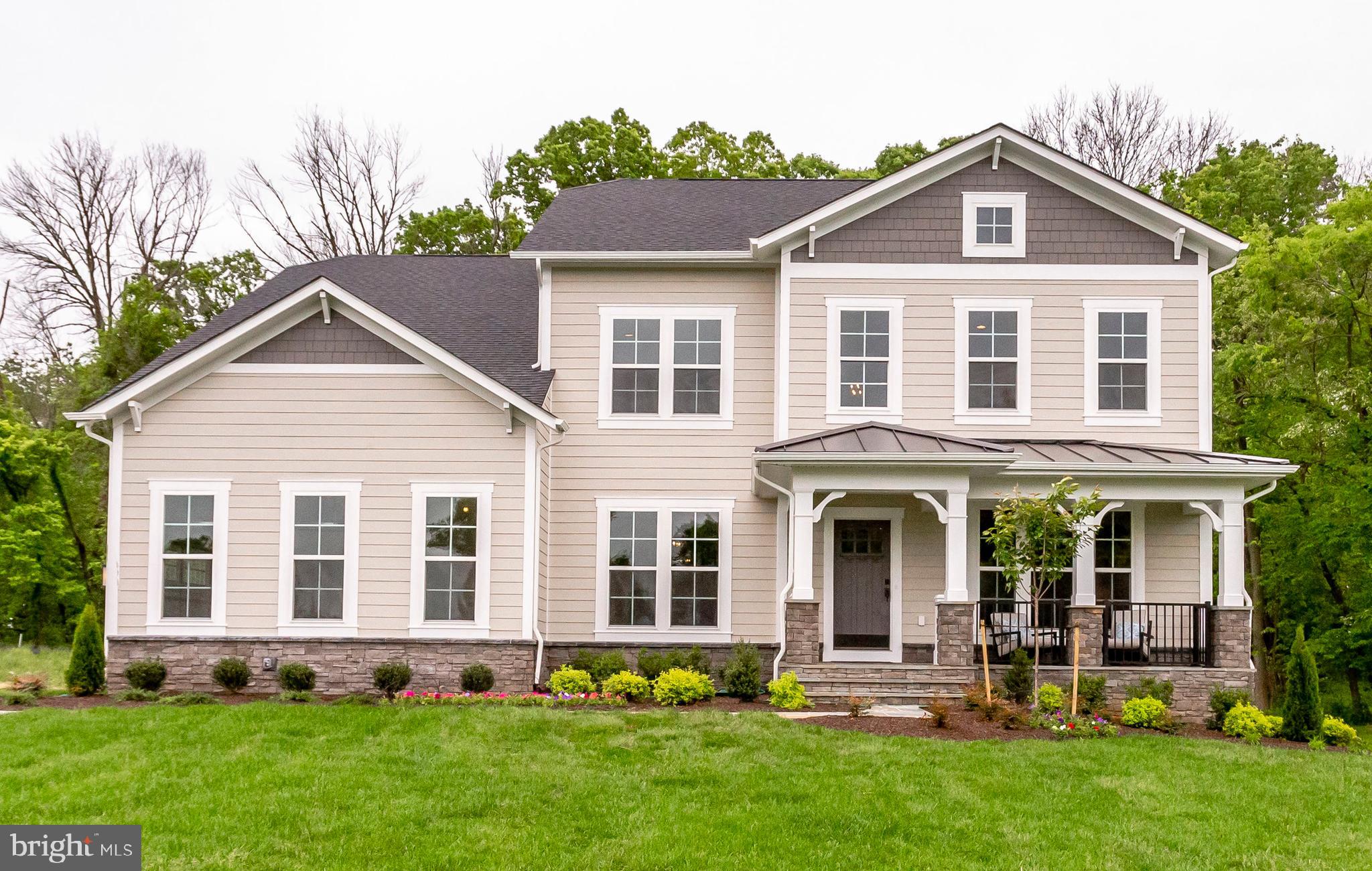 Evergreene Homes brings the Barrett Model to Fairfax, Virginia at Woodson Reserve. This luxury home is perfect for families of all sizes. This homesite is located in a highly ranked school district (Woodson High) for all school levels and is available to move in now!This Barrett Model is a classic craftsman design with an open floor plan and the following features:  5 BD | 4.5 BA | 5,370 SF | Three Car Sideload Garage  Deluxe Kitchen with Upgraded Stainless Steel Appliances  Wideplank Hardwood Flooring  Craftsman Oak Main Stairs  Morning Room and Library on Main Level  Upper Level Laundry Room with Utility Sink  Energy Efficient Home Construction with 2 6 Framing