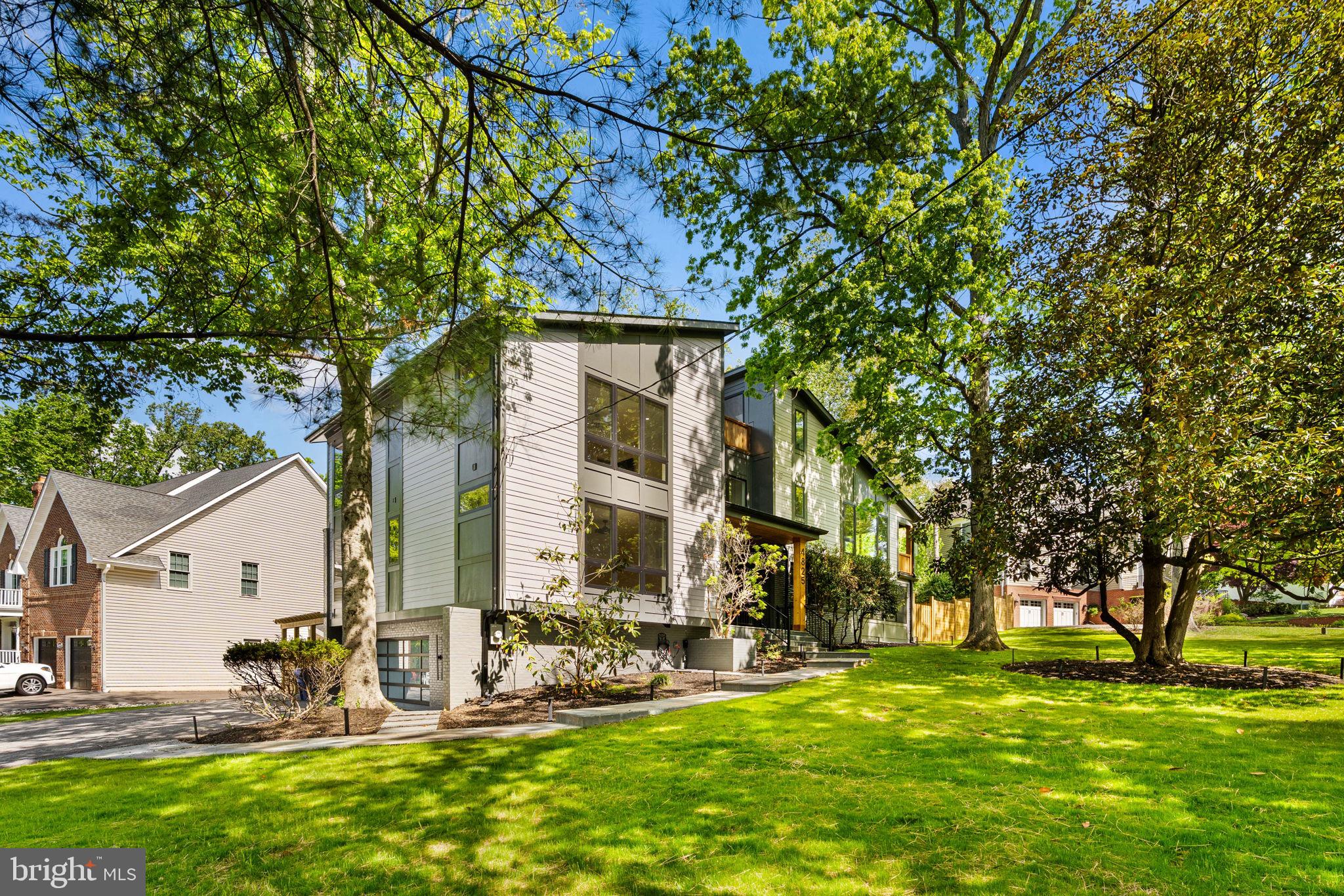 **$125,000 Price Improvement--Open Houses Saturday, 5/9 10-12pm & Sunday, 5/10 1-3pm** WELCOME to 4825 GREAT OAK RD., a truly exceptional residence in the heart of Manor Park, one of Montgomery County’s best kept secrets. This custom-built masterpiece by S and R General Contractors offers five bedrooms, five full and two half baths, and four thoughtfully designed levels, seamlessly blending luxury, comfort, and functionality. From the dramatic two-story foyer to over 400 square feet of enclosed patio space, a one of kind, private rooftop terrace, and a fenced rear yard with flagstone patio, every detail has been crafted for effortless entertaining and refined everyday living.

The home’s main level is anchored by a gourmet chef’s kitchen featuring a massive waterfall quartz island, premium appliances, and dining for twelve, complemented by a stunning glass-enclosed patio/three-season entertainment room with gas fireplace and a bright, open great room with a custom wet bar. A spacious guest suite, private home office, and seamless indoor-outdoor transitions make this level ideal for both hosting and home life. Upstairs, a luxurious primary suite offers dual walk-in closets, a spa-inspired bath with soaking tub and seamless glass steam shower, and a private balcony, while the uppermost level provides a vaulted recreation room and breathtaking rooftop terrace, giving you the feel of being in your own private treetop oasis.

Living in Manor Park means more than just owning a beautiful home; it means becoming part of a vibrant and close-knit community. This one-of-a-kind Rockville neighborhood is celebrated for its wide array of architectural styles, mature trees, and generously sized lots, many spanning one-third to half an acre or more. Bordered by Norbeck Road, Bel Pre Road, and Georgia Avenue, Manor Park offers the rare combination of a park-like setting with easy access to shopping, dining, and major commuter routes, all just minutes away.

At the heart of the community is the renowned Manor Country Club (*joining fee waived with the purchase of the home*), featuring 27 holes of golf, tennis and pickleball courts, swimming pools, and exceptional dining, along with beloved neighborhood events like the Great Oktoberfest. Generations of families have called Manor Park home for its welcoming spirit, unmatched convenience to BWI, Dulles, and Reagan National airports, and proximity to the Metro’s Red Line, I-95, I-270, and the ICC/MD-200.   Here, 4825 Great Oak Rd isn’t just a home; it’s your gateway to an elevated lifestyle where luxury, community, and convenience come together in one truly extraordinary address!