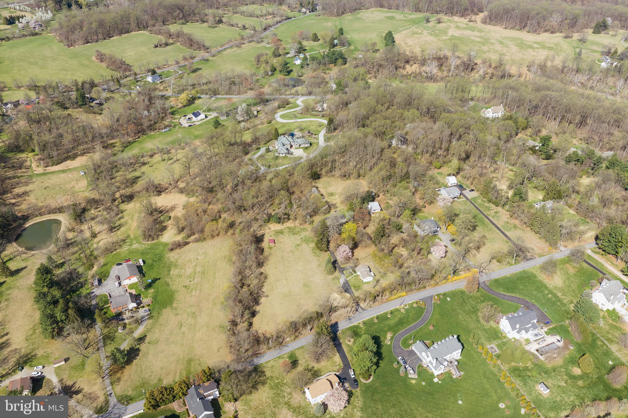 Tranquil Country Estate w/ peaceful privacy - very RARE to find a property like this - marvelous sunset views, just minutes to towns of Paoli & Phoenixville, & you can  look 360 degrees & only see your property! You can finally get what you've been looking for- whether it's a family compound, organic gardens, room to run or have horses, play sports, build the dream house you have plans for, or just relax  & watch the sunset in peaceful harmony! 3 Dwellings on 7.2 Acres- Main House: 4 BRs, 2 Bths, Caretaker's Cottage: 2 BRs, 1 Bth, & Studio/ Apartment above oversized Garage has 1 BR & 1 Bath.   "Diamond Meadows"  has a stone wall fronting the quiet part of Diamond Rock - near Clothier Springs & Horshoetrail Trail.  Driving past stonewalls onto the property takes your breat away w/ amazing panoramic views.  Across from the front meadow  is a Charming Cottage w/ 1 floor living: Family Rm, 2 BRs, 1 full Bath w/ skylight, Laundry Rm, Kitchen open to DR w/ picture window, & full bsmt.  Next up the drive is Main House w/ a Great Rm that's width of building, & has a sunset view & superb light from 3 walls of windows, w/ 4th wall having a section of stone where there was a wood stove.   Good flow continues to a sunny Dining Rm. at back of big Foyer, Eat in Kitchen w/ Butler's Pantry & door to back yard.  There's a full Bath w/tub, & big Laundry/5th Bedroom.   Upstairs are  4 large Bedrooms & full Bath, all w/ good sized closets,   At the end of the driveway is an oversized Garage w/ big Laundry/ Storage Rm on main floor & upstairs thre's a sun drenched Apartment that would be  perfect for an Artist's  Studio-  as there's lots of light from many windows & a big picture window in the Bedroom.  Studio Floorplan has Kitchen open to Family Rm.  & Dining area.   Subdivision started - may be able to have 3 existing dwellings on 1 LOT, & potentially 2 more building  LOTS- that can fit larger homes, pools, & barns- like across Diamond Rock!   This canvas is ready for your ideas - family compound,  farmette w/ animals, fields of flowers or holisitic/ organic self sustaining gardening - maybe start a farmstand!  Very desirable location has quiet privacy in the country, but lets you get everywhere quickly.  Back in 1920, this homestead was started by the Woodward family, who owned a Hat Shoppe in Phila.  Calm in the country- yet mins. to the R5 train in Paoli!  Seller has started engineering work for potential subdivision-  See attached Plot Plans in documents or call Missy for updated info.  Excellent location close to the Main Line, Paoli Hospital & Train,  Hip & Happening Phoenixville,  the turnpike, Rts. 202 & 422.  Valley Forge Park is around the corner, w/ miles of trails to hike, bike & ride horses.  Valley Forge Swim Club on the Mountain has racquet & B-Ball courts & the Pool is perfect for the dog days of Summer & meeting your friendly new neighbors!! Improvements inc: new septic system for Main House & Garage / Studio, new roofs, & new heater in Main House- so you could move right in & create the Home of your dreams!  The main homesite was probably chosen in 1920 for its fabulous southern exposure & the existing home has great flow, spacious rooms, & wonderful views from every window!  Main house is in good shape and waiting for your personal touches  - maybe add a MBR over the Great Room?  Seller is open to offers that do NOT have a subdivision contingency! Possible Seller's assist to Buyers to add Hdwd. floors or granite in Kitchen AFTER Settlement - Lots of updates let you move right in - available for quick possession!  So Let's talk -  OPEN  SUN. 6/14 from  1 to 3 - "LOTS" of possibilities - are you ready to make your dreams come true?