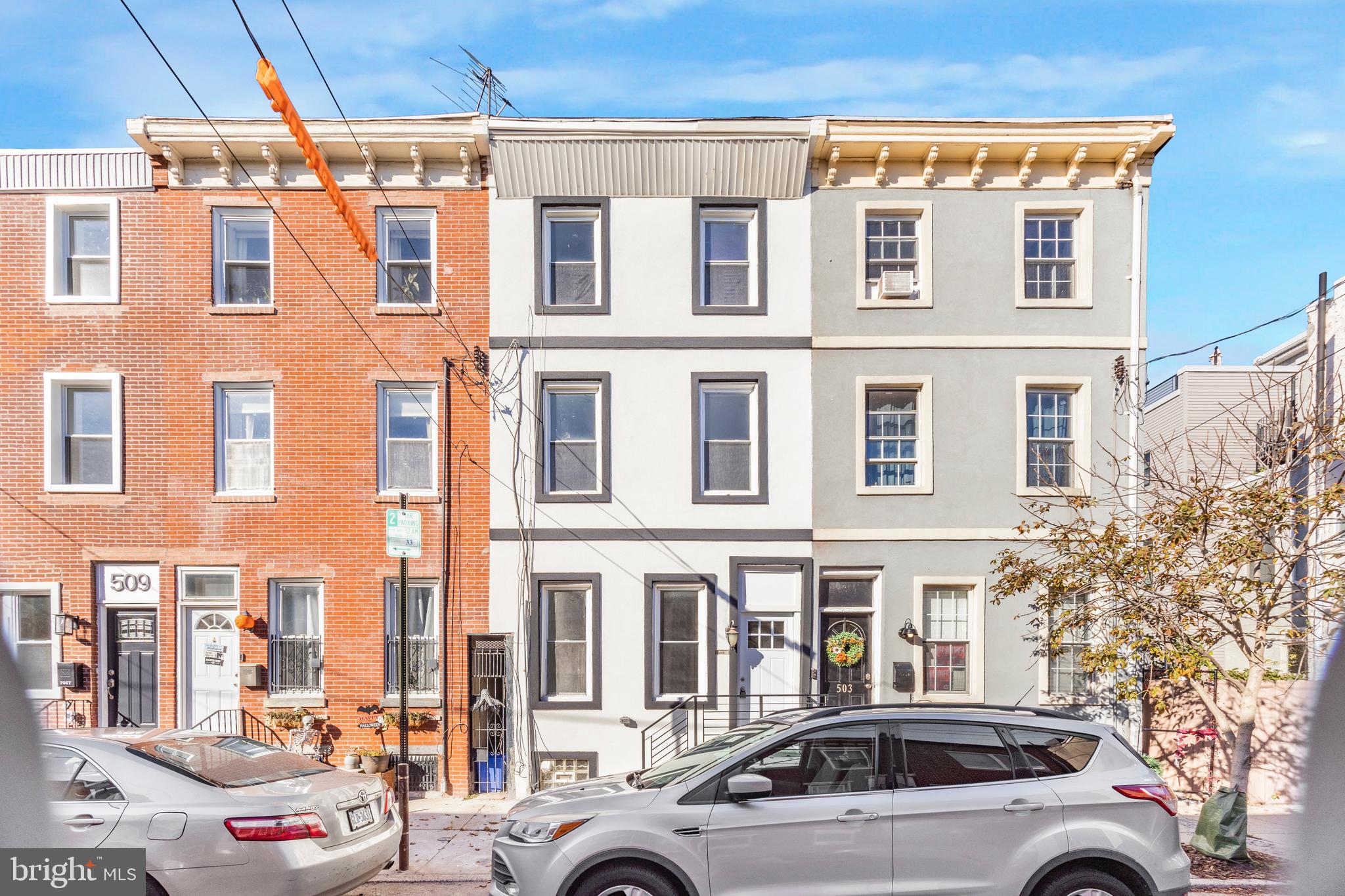 Welcome to this fully updated three-story home located in the desirable Dickinson Narrows neighborhood—known for its local restaurants, residential charm, and convenient access to public transportation and the South Philly Sports Complex.

The main level features an open and airy layout with durable vinyl flooring throughout. A spacious living area connects seamlessly to a modern two-tone kitchen with marble countertops, blue lower cabinets, and crisp white upper cabinets accented in gold. A conveniently placed half bath completes the first floor.

The second level includes two well-sized bedrooms and a full bath, each designed with modern finishes and abundant natural light.

The top level offers a private primary suite complete with a generous bedroom, walk-in closet, and a dedicated full bath—creating an ideal retreat space.

The fully finished basement provides additional living flexibility and comes equipped with premium Bosch appliances, perfect for laundry and storage needs.