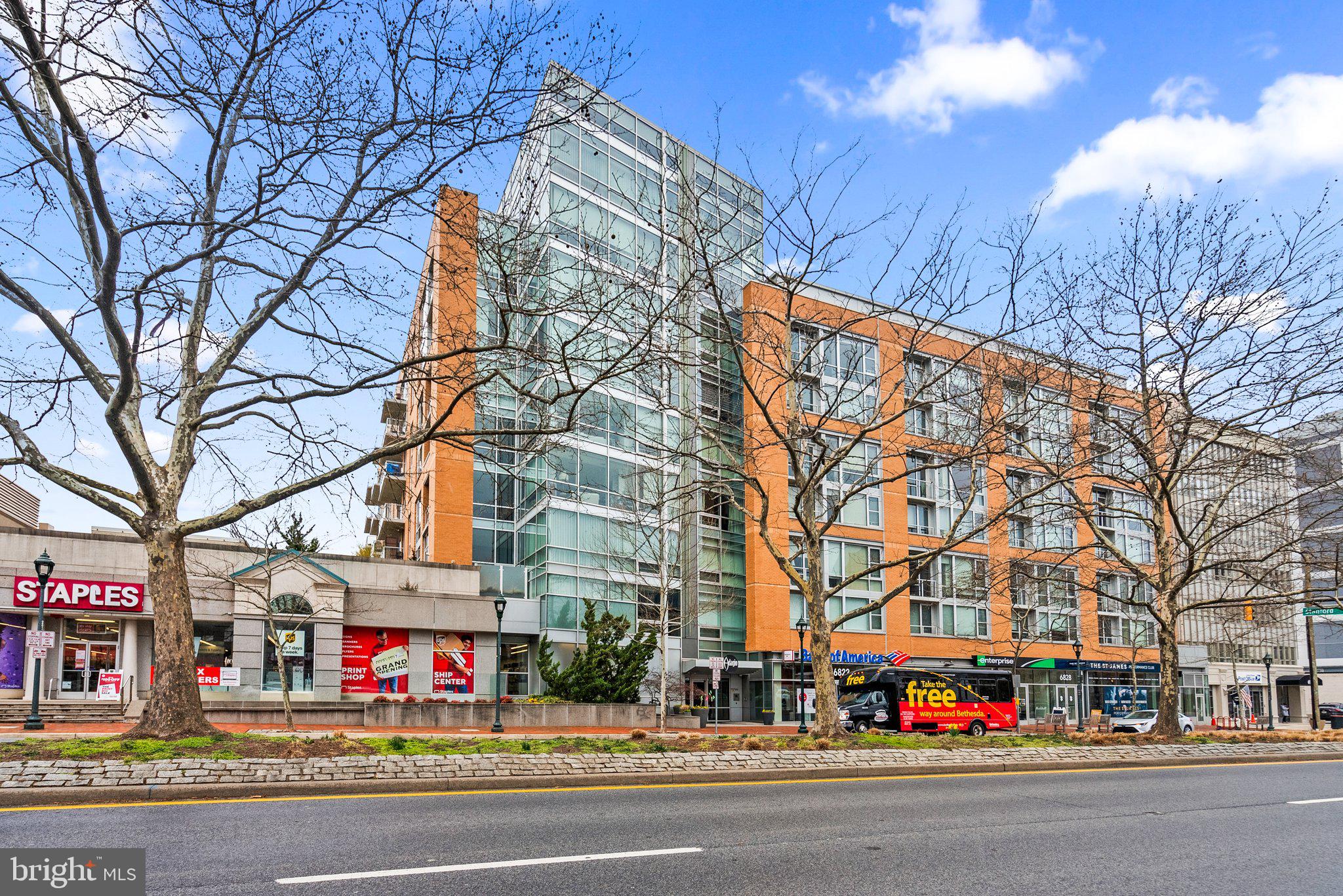 Welcome to the Adagio – Unit 5003, a light-filled 1 Bedroom + Den (2nd Bedroom is Den) with 2 full baths, open living space, and floor-to-ceiling windows.  Spacious, sun filled open floor with wall of windows features generous living and dining areas, kitchen with center island, bar seating, premium stainless steel appliances including a Wolf gas cooktop and a Sub-Zero refrigerator.  Gleaming hardwood floors throughout. The primary bedroom suite offers 2 large closets plus en suite bath.  The den does not have a window but serves as a great home office/guest bedroom with easy access to 2nd full bath.  Recent upgrades include: modernized primary bath, built in bookcases, HVAC system, custom built pantry and closets, custom lighting in entry and kitchen, dimmers, rocker switches installed, motorized shades. Assigned garage parking space #23.  

The Adagio is just a few short blocks to shops and restaurants of Bethesda Row, Bethesda METRO and 1 mile to Friendship Heights – this location is one of the best in the area. Step out your front door to Trader Joe’s, CorePower Yoga, the new St. James Club Target, Starbucks, shops, restaurants and more! Enjoy The Adagio’s many amenities include a 24-hour concierge, fitness center, large courtyard with lounge seating, reading room. Secure, reserved parking for owner plus guest parking.