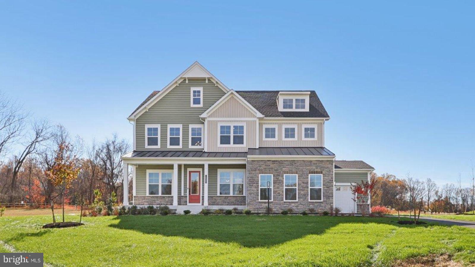 To be built- build time approximately 5 months. This Stonehaven floorplan offers 5-bedrooom, 4.5-bathroom residence with a 2-car garage. Buyers have an option to increase the size of the home to a 6 bedroom, 5.5 bath, 3 car garage with finished basement. The open concept floorplan with soaring 10 ft. Ceilings and abundant natural light creates an abundance of natural light creates a warm and inviting atmosphere. A formal dining room is opposite the study at the entry. For convenience, a butler pantry w/ beverage cooler is located off the dining room leading to the kitchen. The kitchen/family room area includes a highly desirable open concept feel and includes a tray beamed ceiling. Double glass sliding doors provide a gorgeous, wooded view of the outdoors. Our Chef’s-Kitchen is included with 5 burner cooktop, triple door refrigerator, dishwasher, microwave and double oven. An abundance of storage is provided with the walk-in pantry conveniently located off the owner entry from the garage. A main level bedroom ensuite is at the owner entry as well and includes a full bath and walk-in closet perfect for multi-generation living. A grand oak staircase with metal balusters is centrally located and 4 bedrooms, a loft, and laundry room complete the upper level. The primary suite is a private retreat with spa-like ensuite bath with free-standing tub and walk-in shower with doors and transoms. Overhead rain shower heads, handheld shower, and central shower heads finish this incredible bathroom. Many area conveniences include the new South Lake shopping center. Perfect for commuting this location has quick easy access to Rt. 301, Rt. 50 and Rt. 4 to Washington, DC, Annapolis, or Baltimore. We can’t wait to welcome you to your new home!