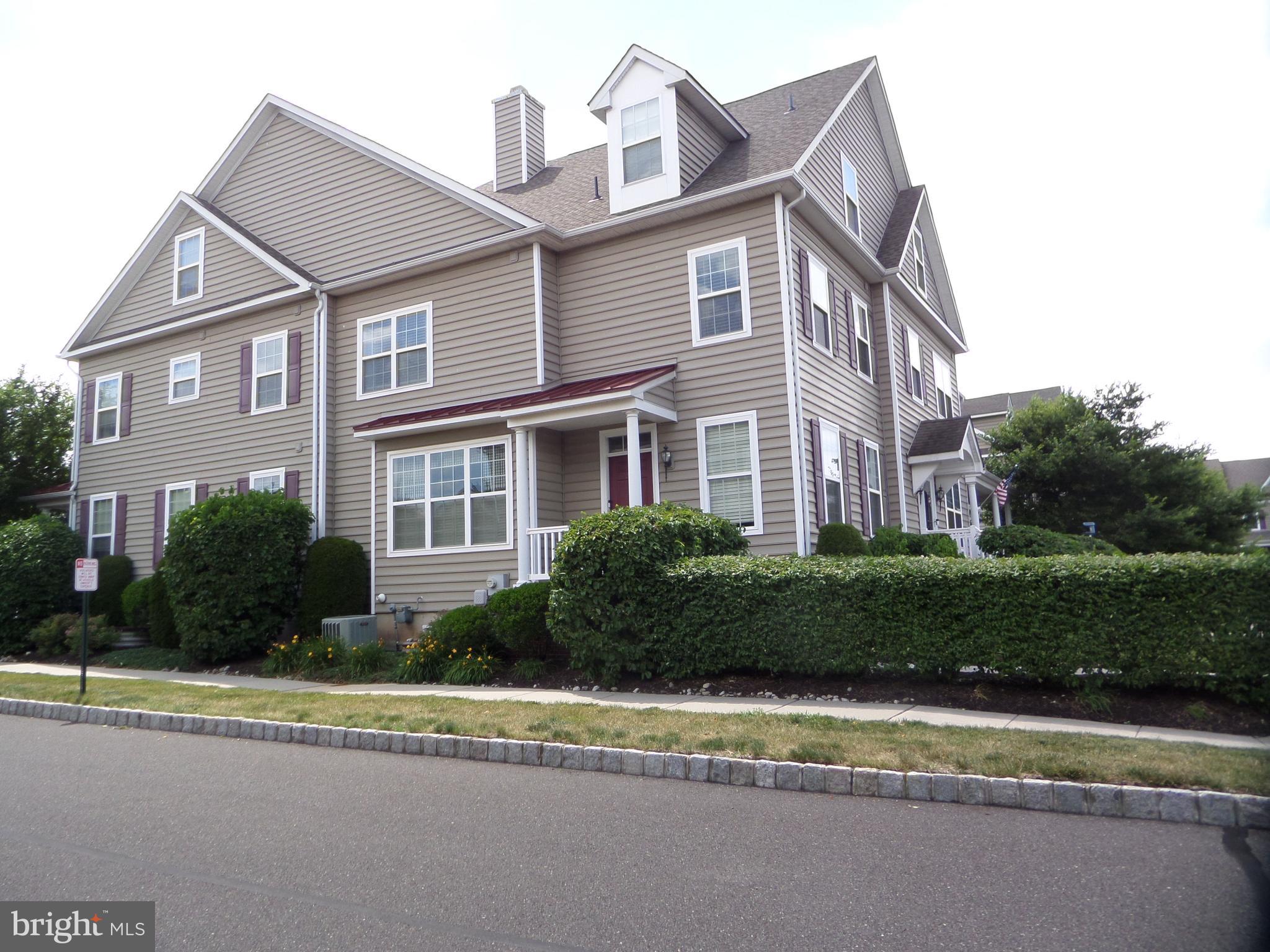 Welcome to the beautiful end unit Townhome in Bedminster, Bucks County.  Walk-in to the open floor plan with a large Family Room and wonderful eat-in Kitchen.  The Kitchen has 42 " Chestnut cabinets with a granite countertop, and a subway tile backsplash.  There is a gas range, built-in microwave, disposal, dishwasher and refrigerator with ice maker to delight any weekend Chef.  There are hardwood floors in the foyer and kitchen eat-in area along with White Wooden Blinds on the large windows.  A main staircase leads to a Powder Room and down into finished basement area with an emergency exit and the utility room. Going up the staircase leads to the landing Laundry Room with included washer and dryer.  A few more steps up, leads to the main bedroom floor with the Master Bedroom and full bath and a large 2nd bedroom and hall bath.  Finally, a few more steps higher bring us to the 3rd floor bedroom with a full walk -in closet. This home is ready for you to move in and enjoy. The Bedminster Hunt Community with lots of amenities will delight any new homeowner.  Don't wait to see this wonderful home.