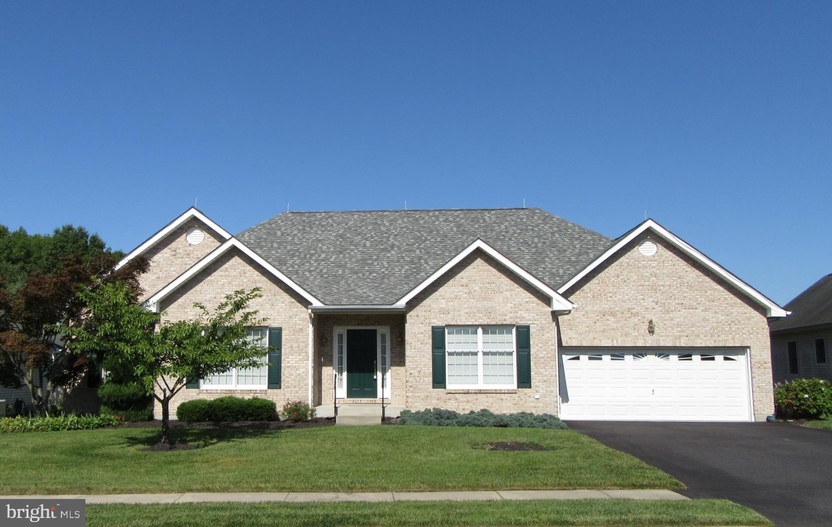 3BR/2.5BA brick front rancher with screened porch, paver stone patio, and fenced backyard. Appoquinimink schools and north of the canal. 9ft ceilings throughout. Finished in place oak hardwood floors in many rooms including the Kitchen, Breakfast Area, Formal Dining Room, Foyer, and main hallways. Large Kitchen with 42 in. cabinets, walk-in Pantry, Desk, Breakfast Bar peninsula with overhang, ceiling fan, and under cabinet lighting. Gas range. Built-in microwave and an additional wall oven. Definitely a cook's kitchen! Adjoining Breakfast area with slider to large screened porch with vaulted ceiling, ceiling fan, and skylights. Formal Dining Room with recessed lights and decorative chandelier. XL Living Room / Great Room with brand new Berber carpeting, cathedral ceiling, ceiling fan, and gas fireplace with decorative mantel and marble surround.  Main level laundry closet with utility tub and wall cabinets for extra storage. Half bath with pedestal sink. There is also an additional room which could be used as a 4th bedroom (has a closet) or home office . The Primary Bedroom is spacious and has a large walk-in closet as well as access to a private bath with double sink vanity, oversized stall shower, and corner jet tub. The other two bedrooms have double-sized closets and share a Hall Bath. All bedrooms have ceiling fans and there is a large linen closet in the bedroom hallway for added storage. The screened porch leads to a custom paver stone patio and the fenced backyard (two large gates for easy access). A row of arborvitae along the back property line provides added privacy. The full unfinished basement has Bilco egress and rough-in plumbing for a full bath for future finishing. Newer high efficiency gas heat and central AC. High efficiency gas hot water.  Whole house lightening protection system.  Mansion Farm offers sidewalks, street lights and multiple playgrounds throughout the neighborhood. Easy access to shopping , major commuting routes, and within easy biking distance to Lums Pond State Park.  Quick possession possible. Agent related to sellers.