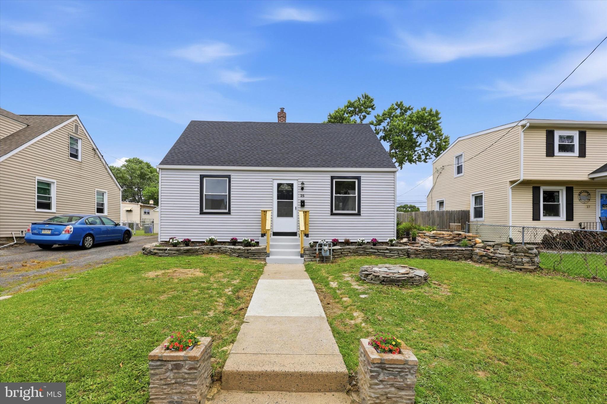 Welcome to this beautifully renovated Cape Cod home in the heart of Norwood. From the
moment you step inside, you'll appreciate the seamless flow between the inviting living room and the fully updated, expanded kitchen— perfect for both everyday living and entertaining.
The stunning kitchen features, stylish cabinetry, updated countertops, and modern appliances. Home chefs will love the convenience of the new gas range, complete with a built-in pot filler, making meal preparation easier than ever for family dinners and larger gatherings. 
The first floor offers two spacious bedrooms and a beautifully renovated full bathroom featuring
a double-sink vanity. Upstairs, you'll find two additional bedrooms and the convenience of a half bath. 
Enjoy new luxury vinyl flooring throughout the first & second floor.
Step outside and enjoy a patio just of the kitchen and in the front of the house it is enhanced by a charming stone garden wall ready for your gardening creativity, while a man-made pond will bring this garden to life adding a peaceful and tranquil water feature to the landscape.