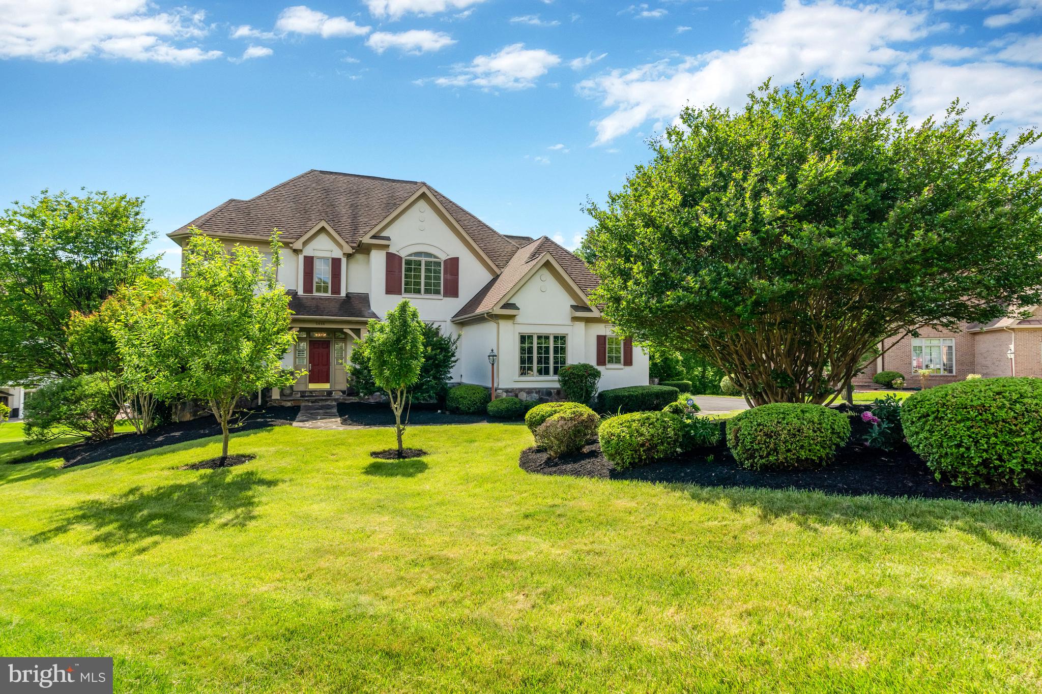 SUNDAY Open House Cancelled.  This spacious 6,500SF home sits on a 0.42 acre lot and is filled with upgrades and designer finishes. Greeted by the stunning, light-filled 2-story foyer and grand staircase you will be instantly wowed. A mix of open concept and traditional living spaces leads to an intimate and welcoming experience. The main level features newly refinished hardwood floors, 3 living spaces, an eat-in gourmet kitchen with upgraded appliances and fixtures, formal dining room, large sunroom, dedicated office/study or den, laundry room, updated powder room, storage spaces, and access to your 3-car garage. Your gourmet kitchen is fully loaded: large island with breakfast bar and storage, stainless steel appliances, Thermador fridge (2023), double oven, 6-burner range, built-in microwave, and glass door upper cabinets. Step through the french doors to your newly repainted rear deck (2024) that is partially covered with a retractable awning on the uncovered portion (conveys). The upper level features newer carpet (2022), 4 bedrooms with 3 full bathrooms (including primary), and a loft area overlooking the grand staircase and sitting room with double-sided fireplace. The primary suite features a large bay window, walk-thru closet with built-in closet system and 3-panel mirror, jacuzzi tub with separate shower stall, dual vanity, and water closet. Upper level bedrooms feature walk-in closets with built-in systems and ensuite bathrooms (one Jack and Jill style bathroom). Take a shortcut from the upper level directly into the kitchen/living space with a secondary staircase before heading to the lower level featuring a large rec room with wet bar, fireplace, 2 additional bedrooms (one in-law suite), media room, and bonus room. Walk-out to your backyard via the sliding glass doors onto stone pathways - to your left you have a private patio and to your right you have a pergola/gazebo structure surrounded by lush landscaping (2024). Additional updates: partial window replacement (2024), driveway repaved (2024), garage repainted (2024), main and lower level repainted (2023), upper level new carpet (2022), lower level new carpet (2024 minus one room), washer and dryer (2022). 

The Carrington community is a sought-after neighborhood boasting scenic wooded trails, tranquil streams, tennis courts, well-lit sidewalks, freshly paved streets, new mailboxes, and a playground. Situated in the desirable school districts of Langley High School, Cooper Middle School, and Spring Hill Elementary. This neighborhood has an enviable location with quick access to major routes like Route 7, the Dulles Toll Road, and I-495 - making a commute to DC a breeze! If you prefer public transportation you’re in luck as this home is less than a mile to the Spring Hill Metro Station. With popular destinations like Tysons Mall, Tysons Galleria, and Wolf Trap National Park nearby, along with a plethora of dining and shopping options, this home is move-in ready and primed for comfortable living!