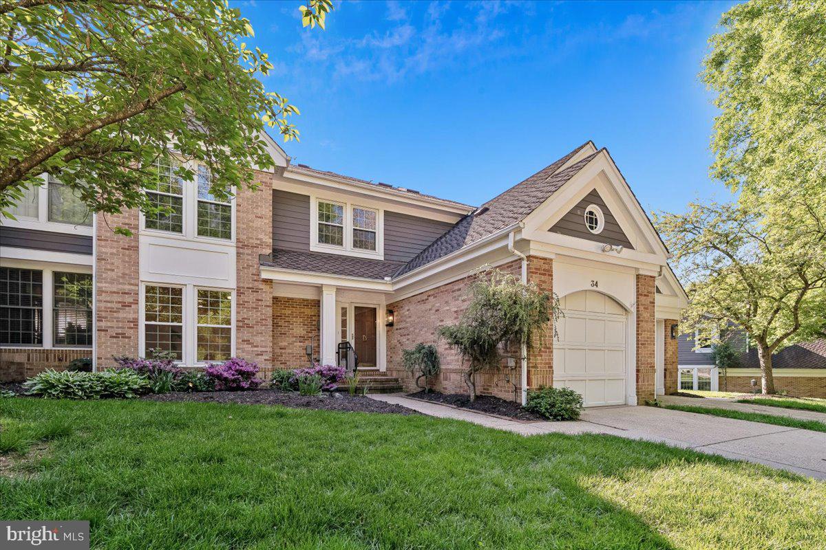Rarely available in College Hills, this beautiful, well-maintained brick townhome offers spacious, light-filled living on a quiet, tree-lined cul-de-sac. Featuring 3 bedrooms, 2 full and 2 half baths, a 1-car garage, and a tranquil wooded setting, this home offers the perfect blend of comfort and convenience. The hardwood foyer opens to an expansive living room and dining room featuring 9-foot ceilings, detailed crown moldings, and timeless architectural touches. The generously sized kitchen offers abundant cabinet and pantry space, wood floors, a breakfast bar, and opens to a breakfast room with a fireplace, creating a warm and inviting gathering space overlooking the peaceful backyard and lush landscaped setting. Upstairs, the primary suite features dramatic vaulted ceilings, a sitting area, walk-in closet, and a luxury bath with a separate shower and whirlpool tub designed for unwinding at the end of the day. Two additional generously sized bedrooms and a second full bath complete the upper level. The walk-out lower level offers exceptional flexibility with a large recreation room, family room, powder room, decorative fireplace, abundant natural light, plentiful storage space, and access to the rear patio, making it ideal for entertaining, working from home, or everyday living. Recent updates include new carpet (2026), new siding and trim (2025), fresh paint (2024), new LVP flooring in the family room (2024), new ceiling fans (2024), air duct and dryer vent cleaning (2024), new air registers (2024), new interior doors with satin nickel hardware (2024), recessed lighting in the LR & DR (2024), white outlets and switches (2024), heat pump (2023), and water heater (2021). Additional highlights include a 1-car garage, driveway parking and ample guest parking within the private cul-de-sac. Conveniently located in Catonsville with easy access to I-95, 695, BWI, UMBC, shopping, and dining. The HOA fee is $272.25 monthly, paid quarterly at $815.75, and includes exterior maintenance such as siding, trim, roof, gutter cleaning, lawn care, snow removal, and more. Be sure to click the film reel icon for the Virtual Tour. Some photos are virtually staged.