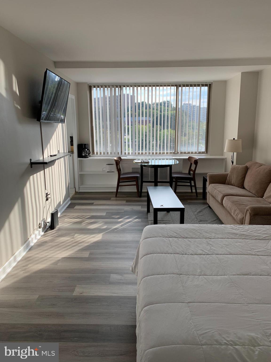 Furnished updated studio apartment (efficiency) with main room, full kitchen and bathroom  in a high rise building in Rosslyn Arlington. All utilities included (heat, gas, electricity, AC, water, sewer) in a low COOP fee (less bills to pay) and plenty of closet space. Convenient and luxurious location, walking distance to the Rosslyn Metro station (Blue, Orange, Silver lines), 10 mints to DC, downtown, pentagon and Fort Meyer. Short walking distance to restaurants, shopping centers, scenic trails, Georgetown and universities. Amazing amenities include concierge service, front desk, gated security with security patrol, controlled building entrance, elevators, recently updated state of the art gym in entertainment center with steam room, sauna, free yoga classes, party and billiard room, large resort style pool with lap lane and hot tub, picnic areas with bar-b-que grills and play ground, River Place Park, on site hair salon, international coffee shop and convenient mini market. Easy access to National Landing, Amazon HQ, I-66, I-395, I-495, I-95, Rt50 and Airports. This apartment is perfect for owner occupant or rental. This is a super investment opportunity, tenant occupied, it is currently rented furnished for $2,100 per month with a tenant already in place. Great return, great cash-on-cash ROI.