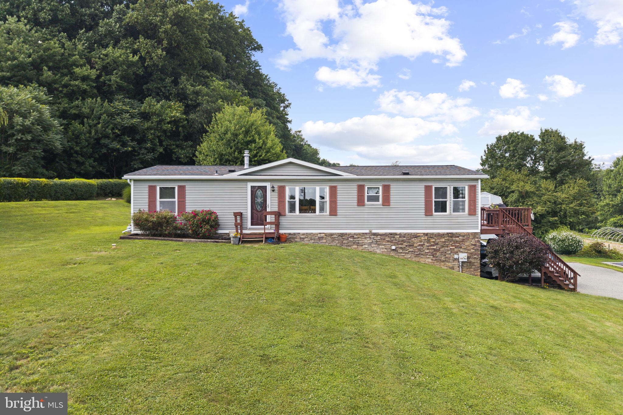 This is the one where peaceful country living meets everyday comfort in the heart of Lancaster County. Situated on approximately ¾ of an acre, this charming 3-bedroom, 2-bath ranch home offers a private setting surrounded by mature trees and plenty of outdoor space to enjoy. Inside, you’ll find a comfortable and functional layout highlighted by a beautiful stone-surround propane fireplace, creating a cozy focal point for relaxing evenings at home. The basement offers additional flexibility with potential for a fourth bedroom, home office, or additional living space to fit your needs. Step outside and take in the spacious yard, established landscaping, and serene surroundings, perfect for gardening, outdoor entertaining, or simply unwinding and enjoying the quiet. If you’ve been searching for a home that offers privacy, space, and the simplicity of one-floor living, this peaceful oasis is one you won’t want to miss. More info & Professional photos coming soon!