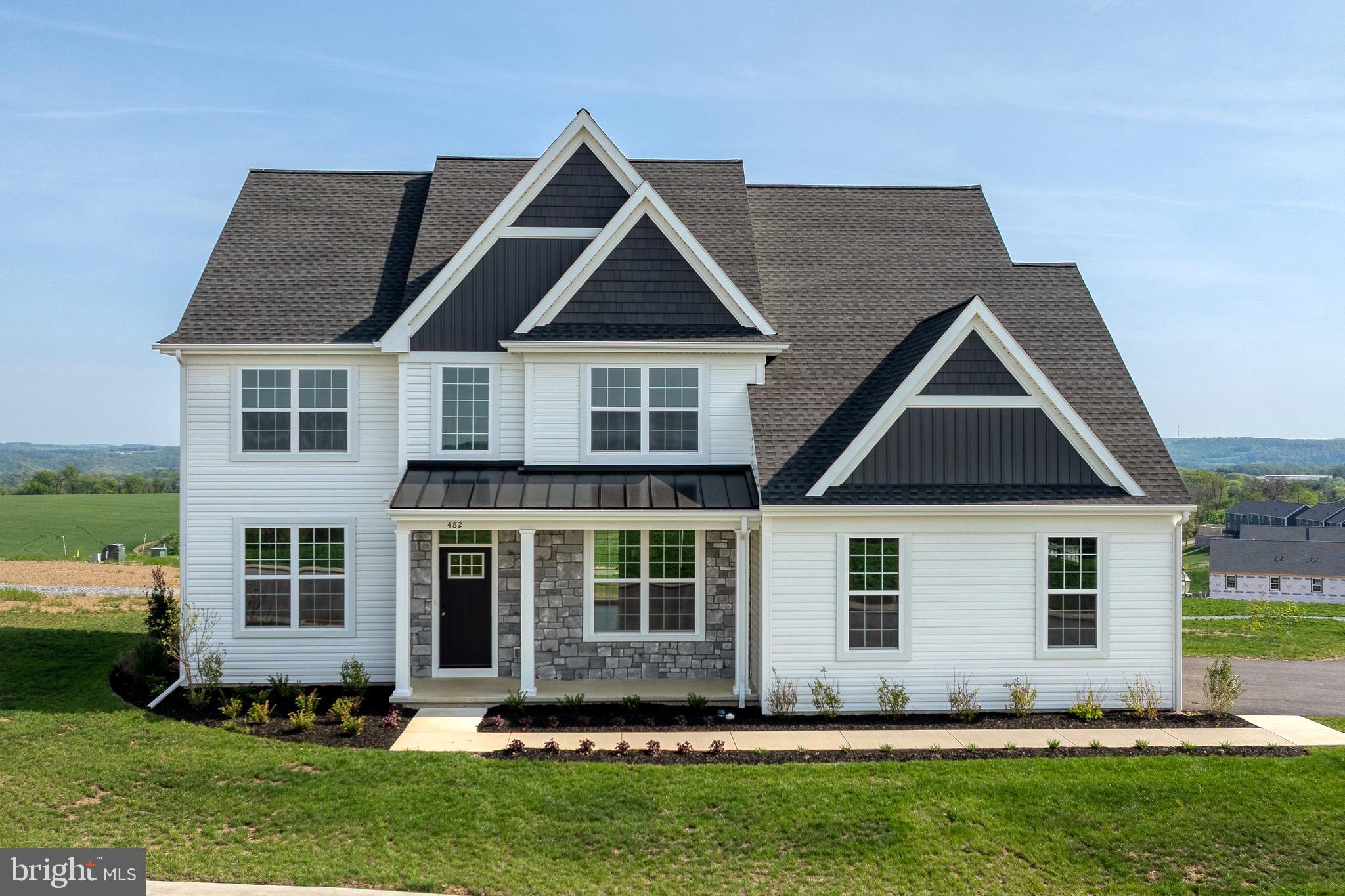 Model Home is located at 509 Windermere Rd
OPEN  Saturdays 1-3pm and Wednesday 4-6pm. 

Can’t find the home of your dreams? Then why not choose a beautiful new home constructed home by Horst & Son Home Builders.. This Windsor model boasts 2,799 sq ft, features 9 ft ceilings (8 ft on the 2nd floor), many large windows and an open plan on the main with Luxury Vinyl Plan flooring throughout the first floor. You're greeted by the 2 story foyer, there is a first floor office with French doors and a separate dining room. The spacious kitchen offers soft close cabinets with an Island and it is stylishly designed with Corian countertop, tile back splash and attractive appliance suite. You'll really appreciate the strategically located mud room and over-sized panty. The inviting living room is bright and open and has sliding doors to your rear patio. Upstairs there are 4 generous-sized bedrooms, 2 full baths and a convenient laundry room. The primary bedroom suite is situated for privacy and offers cathedral ceiling, TWO walk-in closets and a beautifully finished primary bathroom with double vanities and stall shower. Outside you'll enjoy the covered front porch, with attractive standing seam roof, and a rear patio -a perfect spot for gatherings. Pick your lot in the beautiful River Ridge Hills, a new neighborhood with scenic views of the rolling river hills in Eastern York County. There are a variety of lots available. Some premium lots are available that can accommodate daylights basements, some are adjacent to the neighborhood common area and there are a variety which are connected by the walking paths throughout the neighborhood. 

You'll appreciate the convenience of this great location with close proximity to the Eastern York Senior and Middle Schools, Sam Lewis Park, High Point Park, Cool Creek Golf Course, and Long Level Recreation Area with miles of boating.  With just minutes to Rt 30, you are a quick commute to Lancaster or York.

Inquire today or stop by the model home for information on the variety of models available. 

*While there are MANY features included which would be upgrades with some builders, many are included with the standard price. However, some photos and renderings may show upgraded features which may not be included at the base price.*