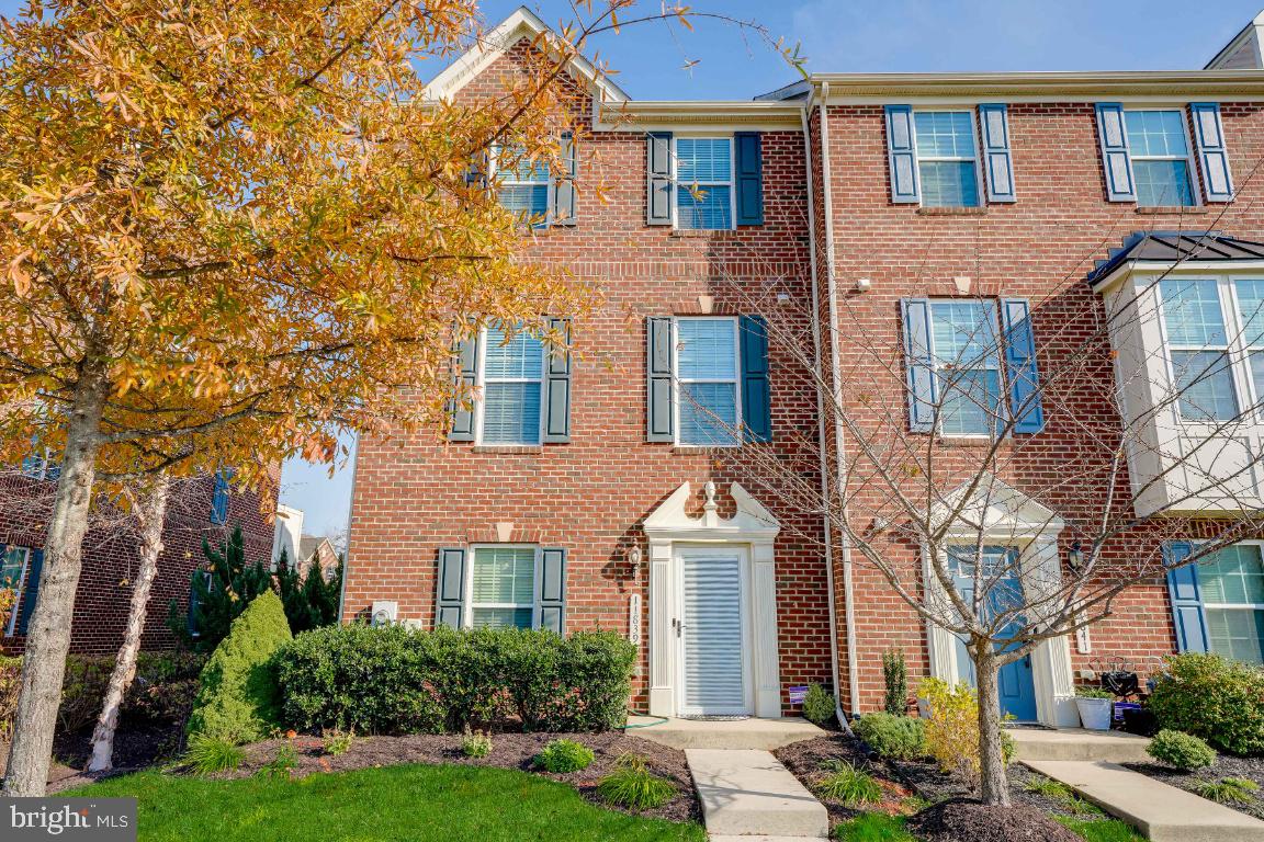 This former model home has all the bells and whistles!  Add it to the top of your MUST-SEE list because you won't find another like it! Featuring main-level living with a huge rec room, cozy gas fireplace, and bedroom with private access to the full bathroom. Enter the two-car garage from the rear entrance and beautifully landscaped backyard. The second level boasts an open floor plan with 9 ft. ceilings, tons of recess and natural lighting, gleaming hardwood floors throughout, a large family room that opens to the Gourmet kitchen with an island, 5 burner gas stove, top of the line appliances, cabinetry, and granite countertops. The 10x16 ft. trex deck is just off the kitchen - perfect for entertaining! The third level is just as stunning. The Master bedroom features a tray ceiling with elegant lighting within, crown molding, and a walk-in closet. The spacious ensuite has dual sinks, a separate soaking tub, and a shower. Down the hall, you'll find a third full bathroom and two additional bedrooms - one with beautiful decorative chair rail. Additional features include upgraded fixtures throughout, pre-wired surround sound, sprinkler system, new hot water heater, water softner with whole house filter, built-in cabinets and shelving in laundry room along with laundry sink. Located close to schools, shopping, entertainment, and commuter routes. Don't miss your opportunity to be the proud new owner!