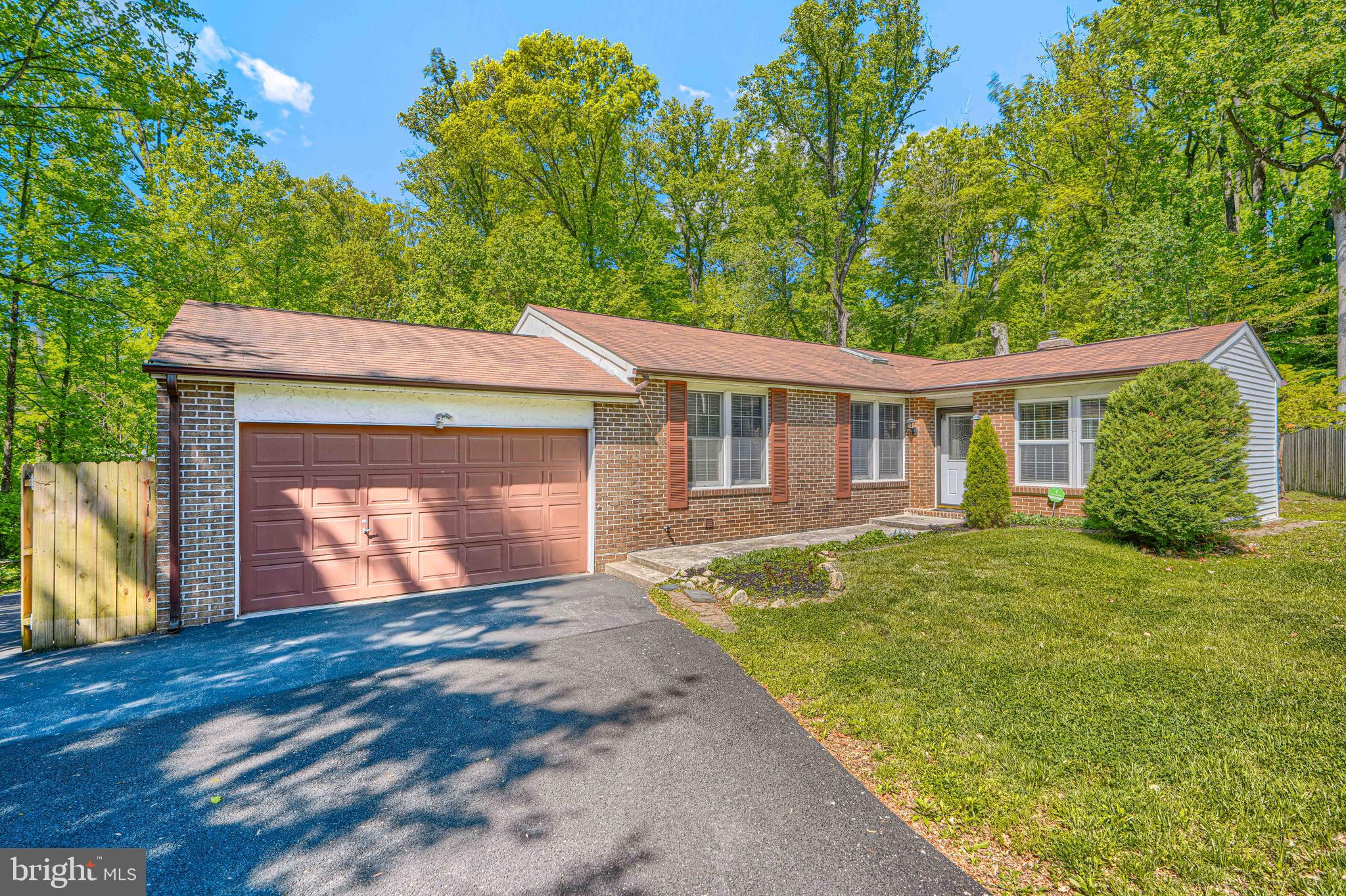 Welcome to this exceptional single-family home located in a cul de sac, offering a thoughtfully designed living space, with 5 bedrooms and 4 bathrooms. This property provides the perfect blend of comfort, functionality, and versatility. 

The main level features a bright and inviting living room, family room, formal dining room, kitchen and laundry area with washer and dryer included. The ideal space for entertaining or relaxing evenings at home. The updated bathrooms throughout the home add a modern touch and elevate everyday living. 

A standout feature is the private additional living space, offering flexibility for guest accommodations. With two separate laundry areas, convenience is built into every level of the home. Step outside to enjoy the expansive deck from your dining room or master bedroom. Perfect for outdoor dining, entertaining, or simply unwinding. The extended driveway and attached garage provide ample parking and storage space.

This home truly is an impressive package. Roof approx. 11 years old and waterproofing and radon system transfer with the home. Minutes from local Universities, shopping stores, restaurants and major highways for commuting. Schedule your tour today!