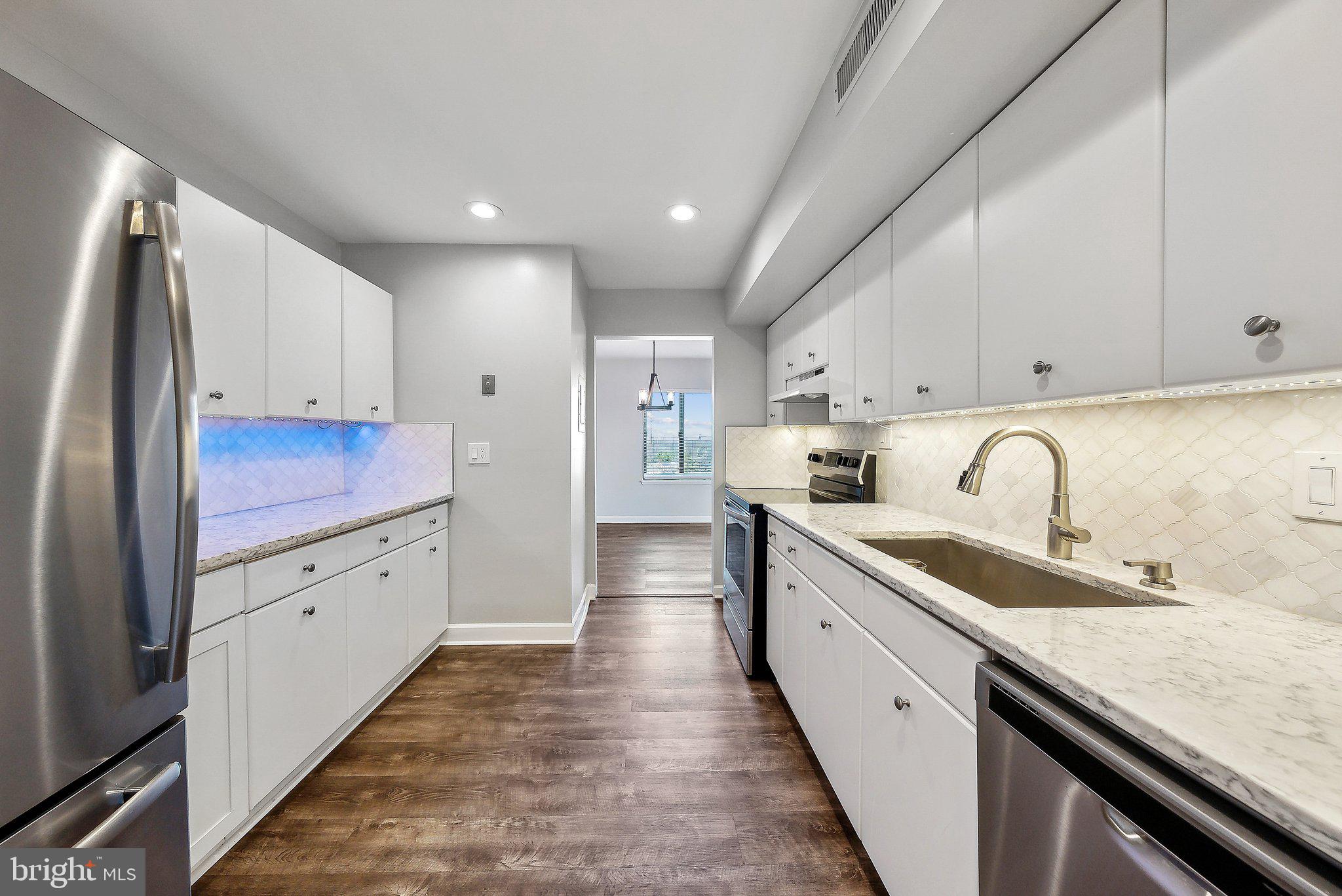 Welcome to 3101 S Manchester Street, Unit 901, a charming 2-bedroom, 1-bath condo in the desirable Woodlake Towers community. This spacious and light-filled unit has been COMPLETELY RENOVATED from top to bottom & boasts an inviting layout, perfect for comfortable living. This top floor, corner unit has large windows flood the space with natural light, creating a warm and welcoming atmosphere. Residents of Woodlake Towers enjoy a wide array of amenities, including common grounds, a convenience store, an elevator, a fitness center, a picnic area, a sparkling outdoor pool, and tennis courts. All utilities included in the condo fee. Located in an unbeatable spot, this condo offers an easy commute to shopping, dining, and entertainment. With its prime location and abundance of amenities, this property is an excellent choice for homeowners or investors alike. Don't miss out on this opportunity to own a home in one of Falls Church's most sought-after communities! Schedule a showing now and take a closer look at your soon-to-be home.