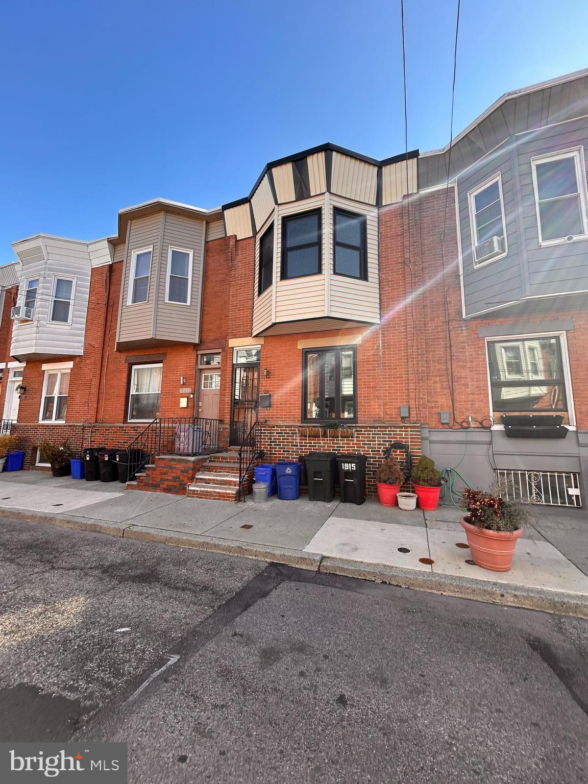 Step up to the plate and swing for the fences with 1915 S Woodstock! This South Philly gem is ready for its next inning. Featuring 3 beds, 1.5 baths, and a killer backyard, it's a home run waiting to happen. Zoned RM1 for multi-unit dwelling, this could be your ticket to living in and earning rental income.

Recent upgrades include new windows, a front door, exterior siding, and a renovated main bath—already rounding the bases toward perfection. With your personal touch, you could knock it out of the park. Consider adding a third story for two spacious units, perfect for renting or making your own.

Located in the heart of South Philly, you'll be steps from local favorites like Miss Rachel's Pantry, 2nd District Brewing, and Ultimo Coffee, with Passyunk Ave’s renowned dining and shopping just around the corner.

Sports fans will love the easy access to Citizens Bank Park and the stadiums, making it effortless to catch a game. Plus, with the Broad Street Line and public transit just minutes away, getting around the city is a breeze.

Similar homes converted to three-story duplexes have sold for up to $580,000 once completed. Don't strike out on this opportunity to build equity and enjoy a rooftop deck before Red October!​  This is an estate sale and is being sold in as-is condition. The buyer is responsible for confirming zoning and conducting due diligence on what is allowed to be built or done to the property.