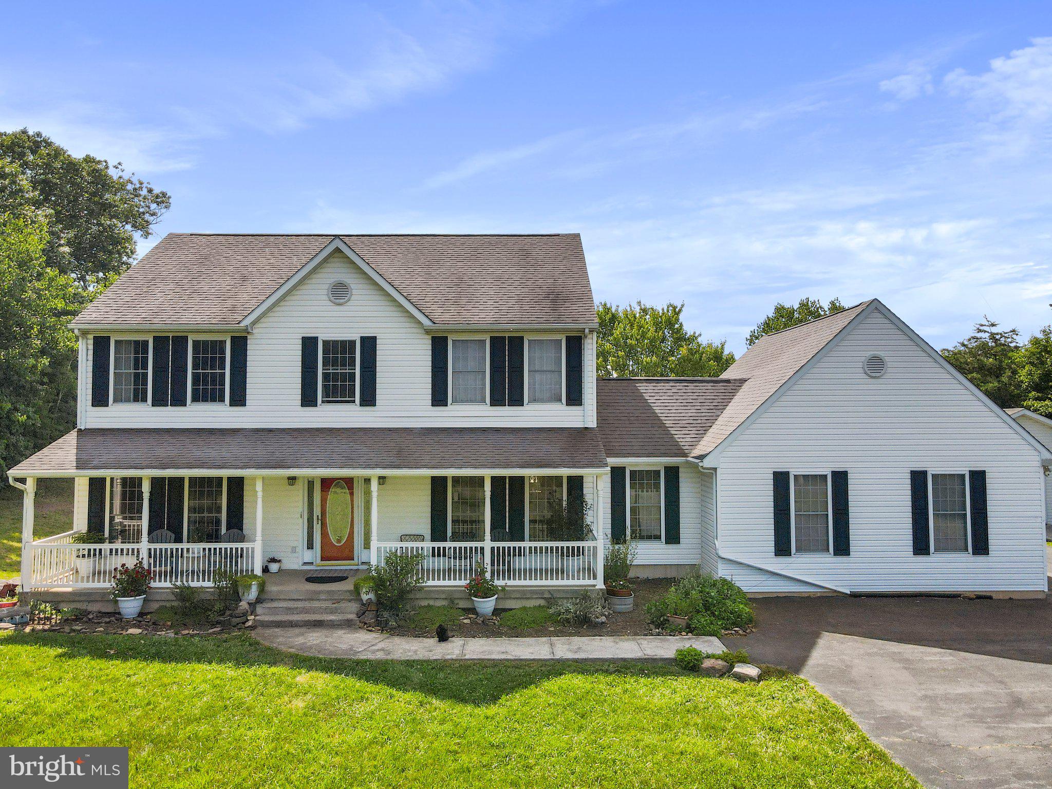 Stately Colonial home nestled atop mountain woodlands on an inspiring 2.5 acre lot. Private yet convenient, only 15 minutes to downtown Berkeley Springs, only 35 minutes to the Hagerstown Valley Mall and adjacent big box stores.
   Spacious 32'x16' deck ideal for entertaining or just enjoying nightly dramatic sunsets. Panoramic vistas all the way to Sideline Hill Gap six months a year. Enjoy golf, fine dining, horseback riding, indoor and outdoor swimming, mountain biking and hiking at nearby Cacapon State Park. The C&O bike Trail is just minutes away. Custom finished Oak floors throughout the entire home, plus a 750 sq ft unfinished cottage/studio above a second garage.