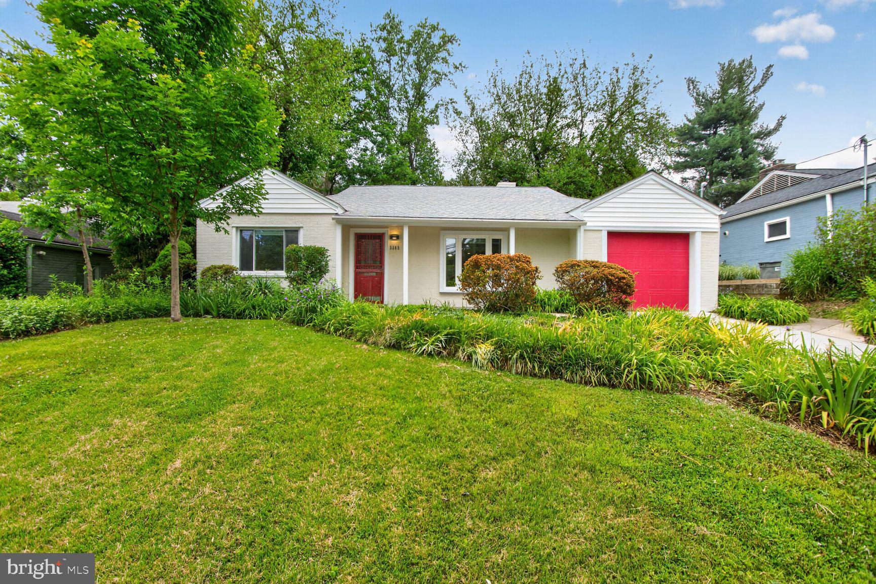 This adorable, spacious one‑level home in sought‑after Rock Creek Knolls offers exceptional comfort, charm, and modern upgrades throughout. Filled with natural light, it welcomes you with a foyer and coat closet that opens into a large living room featuring a cozy wood‑burning fireplace, recessed lighting, and crown molding. The living room flows seamlessly into a bright family room and dining area wrapped in windows overlooking the serene backyard—an ideal setting for everyday living and gatherings.

The renovated kitchen is thoughtfully designed with Honed Quartzite natural stone countertops, stylish backsplashes, stainless steel appliances, an induction range with convection oven, and abundant cabinetry. This home offers three bedrooms and two renovated full baths. The primary bedroom includes a walk‑in closet, a large window, and an en‑suite bath with a stand‑up shower.

Outdoor living is equally delightful. Enjoy a charming side patio leading up wood steps to a peaceful backyard with stepping‑stone paths and a cozy fire‑pit corner—perfect for relaxing, gardening, or entertaining.

With an attached garage, driveway, excellent storage, and a comfortable, easy flow, this home blends convenience with charm. Ideally located near shops and restaurants, Chevy Chase Lake Shopping Center is only 0.6 miles away, and the fine dining and cafés of Bethesda and Chevy Chase are just minutes away. For commuters, Bethesda Metro (Red Line) is only 1.2 miles from the home. Filled with natural light and thoughtful improvements, this beautifully updated property is truly a gem.