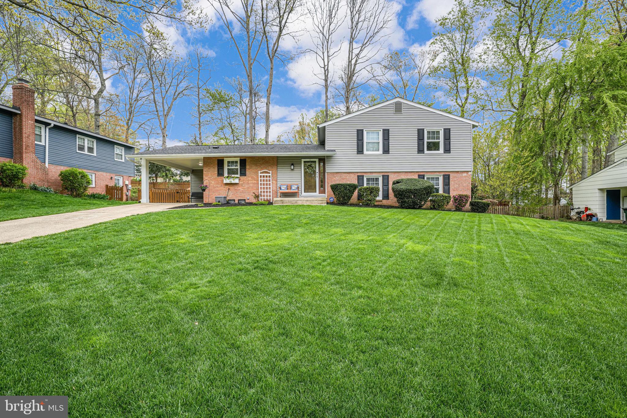Get ready to be wowed by this updated 4 bedroom 2.5 bath Springfield home with an amazing deck and backyard and lawn that is the envy of the neighborhood! This 1,600 total square footage property is meticulously maintained with pride of ownership evident in every room. The kitchen features a pantry with Elfa shelving, stainless-steel appliances, 42-inch cabinets, granite countertops with plenty of counter space, and recessed lighting. A window above the sink allows for a lovely view outside while you wash dishes and a door leading from the carport to the kitchen makes unloading groceries a breeze. Relax in the living room with a great view of the backyard out the large picture window. Enjoy gleaming hardwood floors in this space! Upstairs, 3 bedrooms with hardwood floors and 2 full baths allow for plenty of space for everyone. The primary bedroom features a built-in closet with Elfa shelving, and Bluetooth speakers in the upper-level bathroom ceilings are a fun detail! Need more space for people to sleep? Head down to the lower level for the 4th bedroom and a half bath separated from the rest of the basement with a door for privacy. Also on the lower level is the laundry room as well as a living area with a door leading to the side yard. And speaking of yard, let’s talk about the backyard and deck! A composite deck built in 2020 as well as a fence for privacy built in 2020 and re-stained in 2024. An amazing Skyfort II Cedar Swing Set and Playground for outdoor fun! And a larger graded lot with trees removed, wood retaining walls, and professional landscaping along the fence. Imagine enjoying lovely spring and summer days or entertaining family and friends from the comfort of your own deck! What more could you ask for? All this plus an amazing location with easy access to Rolling Rd leading to 95, 395, and 495 as well as 5 minutes from Trader Joe’s! Don’t wait! Schedule a tour today! New interior doors, fresh paint, new ceiling fans (2025); water heater, new LG washing machine, new flooring in upper level hall bath, lower level bath remodel, basement remodel (2023); fence, composite deck, new GE dryer, kitchen and basement exterior doors (2020); Elfa closets installed (2019); heater circuit board (2018); new stairs and banister, vinyl siding, gutters, roof (2017); upper level bathrooms remodel (2016); front door (2015); playground, new windows, Amana air conditioner, furnace, and coil (2014); kitchen remodel (2011).