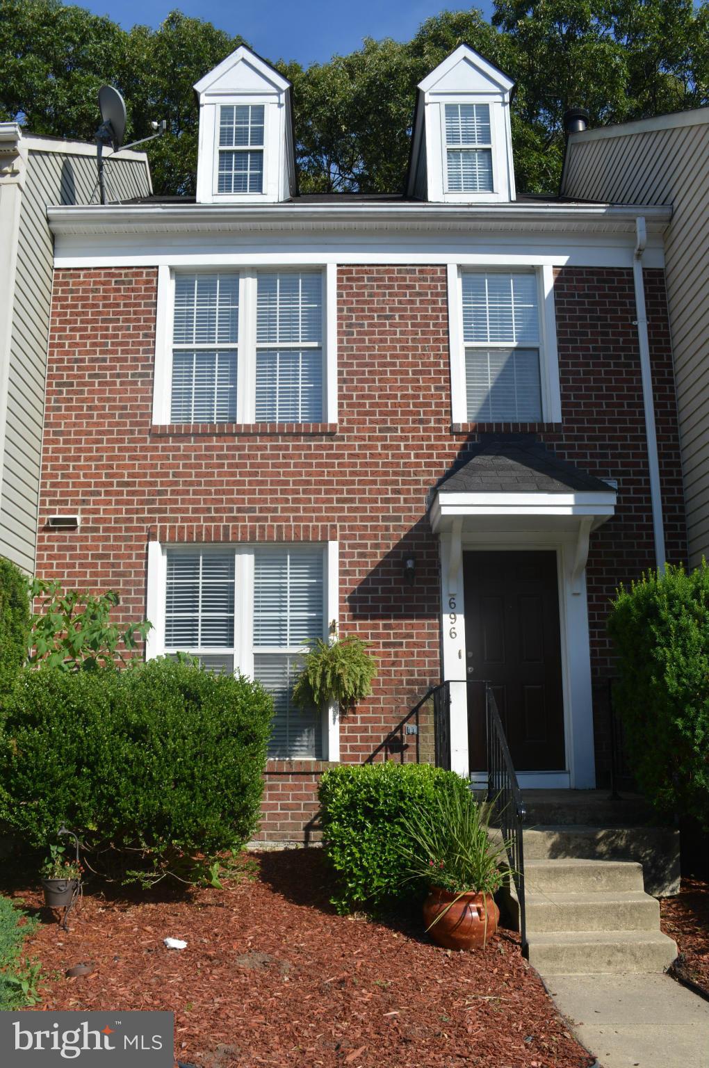 Immaculate 4 level T/H with two Master Suites and Loft. All appliances convey, fenced rear yard, patio, nicely landscaped, brick front, full bath rough in lower level. Has lots of potential and can do quick settlement.