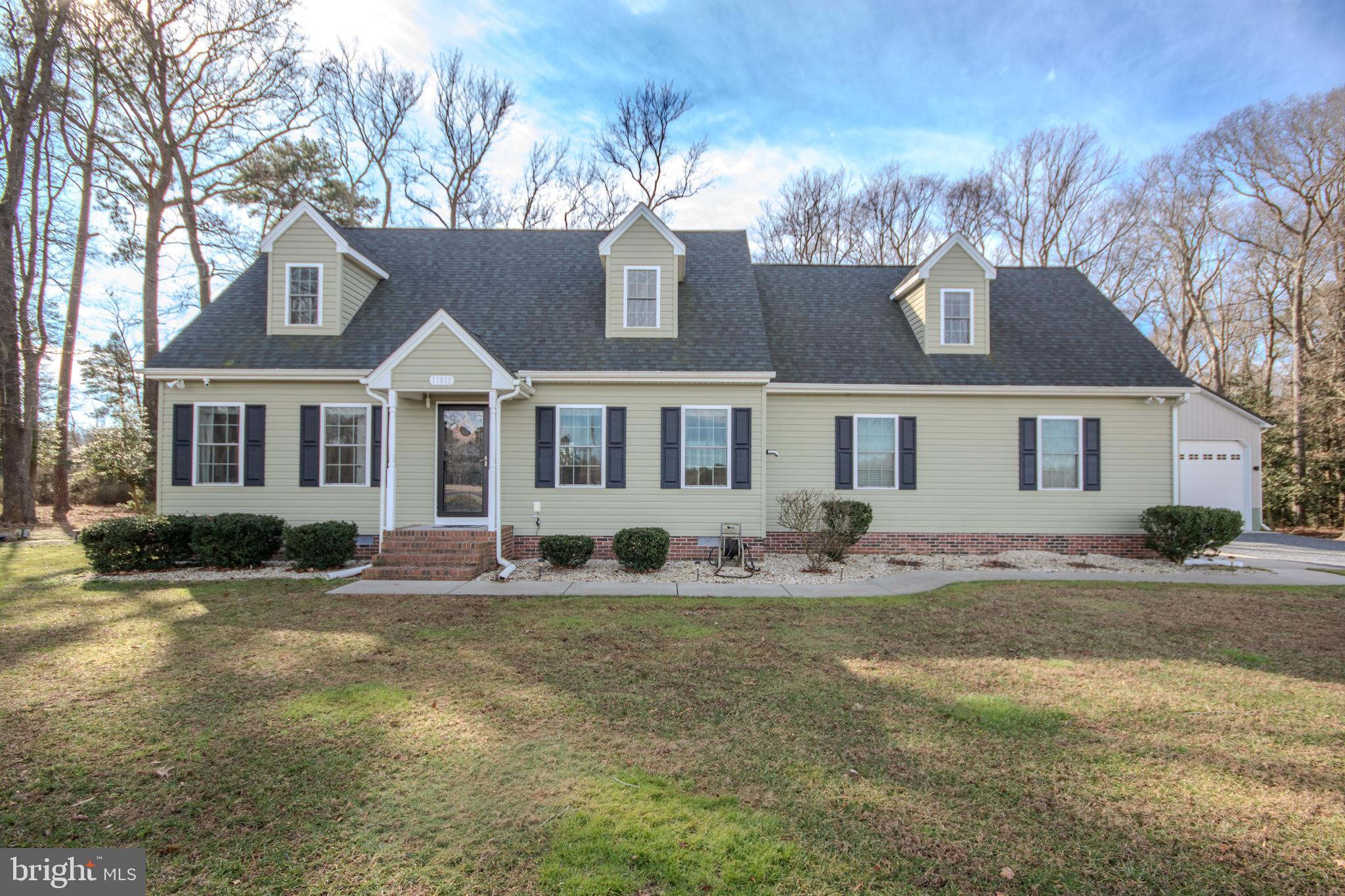 This piece of Eastern Shore paradise is waiting for you! Beautifully maintained cape cod on 2 acres in northern Worcester County. Only 6 miles to Ocean City, 12 miles to Bethany Beach, and 20 miles to the beaches of Assateague. With less than 3 miles to the boat ramp, you can easily get your boat in the water for some fishing or playing. Need a place to store your boat? You’ll have your own 28 by 32 foot heated pole building with doors tall enough to allow for your t-top boat, plus plenty of room for your project car or your workshop and tools. Pole Barn is wired for ethernet and  security cameras. Have an RV? This home has its own RV pad complete with 30amp electric supply. You still have plenty of space in the yard to relax and enjoy the quiet country setting, including a fenced in area for your pets. Spend an evening by the fire pit or watch the backyard nature from your 3 season room.  There is a pad ready and waiting for your hot tub to complete this backyard oasis. This move-in ready home has a first floor primary bedroom with its own bath and walk-in closet (complete with reinforced floor for a safe). The open floor plan allows for easy flow of life between the kitchen and family room.  A pellet stove in the family room makes for extra cozy winter nights. Large utility room and half bath complete the space off the attached garage where you will have plenty of room for your cars, plus even more storage. Upstairs bedrooms are separated by a flex room which could be a playroom, office (already has two built-in desks), den, or whatever else meets your needs. The house has many network drops and is wired for networked security cameras and enterprise grade wifi.  HVAC is controlled by a Honeywell T9, a wifi thermostat with wireless remote temperature sensors.  House is also ready for your generator, complete with a transfer switch.  Large driveway has room for friends and family to visit as well.  Shed with electric offers that extra bit of storage for lawnmower or tools.  This whole property is a must see!! Schedule your appointment today.
Professional pics coming soon.