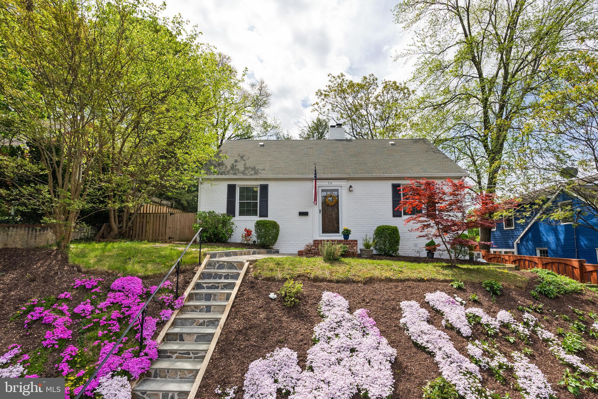 OPEN HOUSE ON SUNDAY 4/27/25 IS CANCELLED - THE HOME IS UNDER CONTRACT
Nestled on a beautifully landscaped knoll in the sought-after Glenmore neighborhood, this beautifully updated 3-bedroom, 2-bathroom Cape Cod blends timeless charm with floor plan perfection in one of Alexandria City’s most desirable areas. Situated on a 5,000 sq. ft. lot (0.11 acres), this home offers unbeatable proximity to the vibrant shops and restaurants of Old Town and Del Ray.

Step inside to discover freshly painted interiors and exteriors, and refinished hardwood floors that flow throughout the main and bedroom levels. Custom built-ins add style and functionality across both levels of this residence. A cozy gas-burning fireplace anchors the living room, while the gourmet kitchen impresses with vaulted ceilings, beautiful, exposed brick, custom cabinetry, stainless steel appliances, and Silestone countertops. The dining area, open to the kitchen, is perfect for both everyday living and gracious entertainment. There is convenient access to the level rear yard from the kitchen/dining area.

The flexible family room on the main level can easily serve as a home office or additional bedroom. A full bathroom with a pedestal tub and custom wainscoting completes the first floor.

The upper-level features two bedrooms and another full bathroom, echoing the charm of the first with a pedestal tub and custom wainscoting. Comfort is ensured year-round with a Fujitsu mini-split system upstairs and a whole-house Carrier HVAC system throughout the rest of the home.

Enjoy the fully fenced backyard, complete with a recently renovated patio—perfect for relaxing or entertaining guests. The front yard was thoughtfully replanted with indigenous plants in 2020, creating a beautiful and eco-friendly outdoor space. There is a hard-piped gas line to the grill for easy dining and entertaining (no propane tank refills needed!).

Recent Upgrades Include:
Fresh interior and exterior paint (2025)
Refinished hardwood floors (2025)
New washer, dryer, and dishwasher (2024)
Trash pad added (2021)
Oversized hot water heater replaced (2018)
Refrigerator and stove replaced (2017)
HVAC and Splits 2017

Enjoy effortless access to everything the DC metro area has to offer. Just a short walk to the King Street Metro, Old Town Alexandria, Alexandria VRE, and Amtrak stations, with quick connections to the Beltway, George Washington Parkway, and I-395—making travel to Amazon HQ2, The Pentagon, downtown DC, and beyond a breeze.

With its ideal location, classic architecture, thoughtful updates, and unbeatable access to the best of the capital region and Old Town Alexandria, this residential gem offers the perfect blend of comfort, style, and convenience—an exceptional opportunity in the heart of Alexandria.

Welcome home!