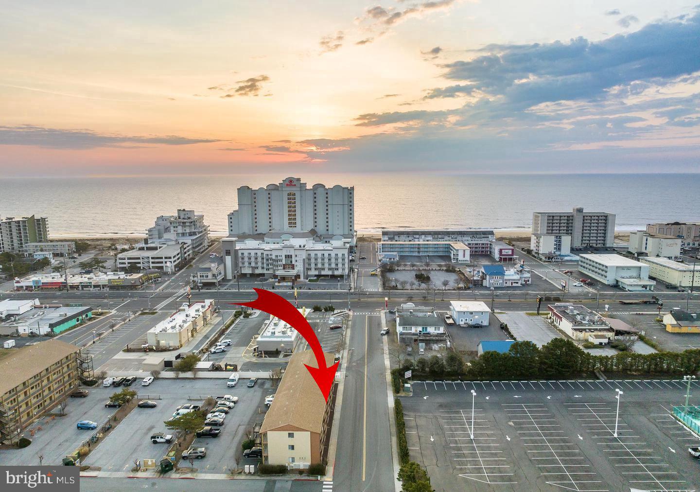 CLEAN AS A WHISTLE! Move-in ready studio condo in the heart of Ocean City, just a short walk to the beach, Boardwalk, restaurants, nightlife, and Jolly Roger Amusement Park. This well-maintained unit features a full kitchen with an electric stove, microwave, refrigerator, and dishwasher, plus a rare in-unit laundry hookup. The updated bathroom includes a modern vanity and mirror, while large windows provide abundant natural light. Ideal as a beach getaway, vacation rental, or investment property with easy access to fishing charters, jet ski rentals, water parks, and all that Ocean City has to offer.