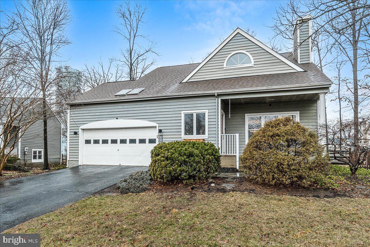 Welcome to this beautifully updated single-family home, perfectly nestled in the heart of New Market, just minutes away from major commuter routes. Tucked away in the charming and peaceful neighborhood of Woodspring—New Market’s best-kept secret—this home offers a tranquil oasis while keeping you close to all the conveniences you need.

Step inside and discover the stunning updates throughout. The main level boasts brand-new hardwood floors (2024) and new carpet (2025), providing a fresh, modern feel. The inviting living spaces include a cozy wood-burning fireplace, ignited by gas for ultimate ease and convenience. The kitchen features newer black stainless steel appliances, complementing the updated bath and making this home move-in ready.

The primary suite is conveniently located on the main level, allowing you to grow old in comfort. Vaulted two-story ceilings enhance the open and airy feel of the living and dining areas. Upstairs, you'll find two additional bedrooms and a large hall bath, offering ample space for family or guests. One of the bedrooms is a loft-style design, open to the lower level, perfect for a home office or gym but easily closed in for added privacy.

The fully finished basement provides even more living space for your needs, whether it’s a media room, playroom, or extra storage. The home also features a fully fenced-in yard, ideal for outdoor activities or relaxing in privacy. Enjoy the serene views as this home backs to walking trails, tucked between mature trees, offering peaceful seclusion.

Located at the end of a quiet cul-de-sac, this home is truly a hidden gem. With a new roof (2019) and a recent HVAC replacement (2020), all the major updates have been taken care of, so you can simply move in and enjoy. Don’t miss the chance to make this home your own!