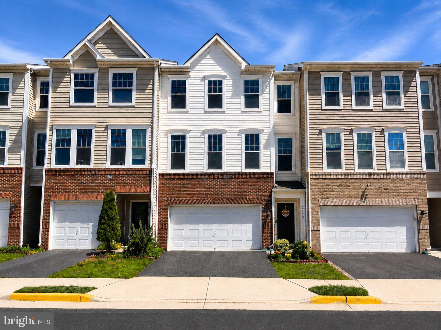 Welcome to this beautiful, move-in-ready three-level townhome in the heart of Stone Ridge! From the moment you enter, you'll appreciate the versatile lower level featuring a spacious recreation room, walkout basement access, and a full bath. This level offers excellent flexibility and can easily accommodate a fourth bedroom by adding a wall if desired. The main level showcases gleaming hardwood floors and an open-concept layout designed for both everyday living and entertaining. Enjoy a spacious family room with a cozy gas fireplace, a casual dining area, and a well-appointed kitchen featuring granite countertops, stainless steel appliances, and ample cabinet space. Upstairs, the expansive owner's suite provides a relaxing retreat with a tray ceiling, dual walk-in closets, and an updated en-suite bath featuring dual vanities and a large walk-in shower. Two additional generously sized bedrooms, a full hallway bath, and the convenience of upper-level laundry complete the top floor. Perfectly situated, this home is within walking distance of Goshen Post Elementary, and John Champe High School. Enjoy being just steps from Stone Ridge Village Center with its shopping, dining, and everyday conveniences, as well as the Dulles South Stone Ridge II Park & Ride for an easy commute. Offering comfort, convenience, and an exceptional location, this beautiful home presents a rare opportunity in one of Loudoun County's most sought-after communities. Come fall in love and make this wonderful home yours! Photos may be virtually staged