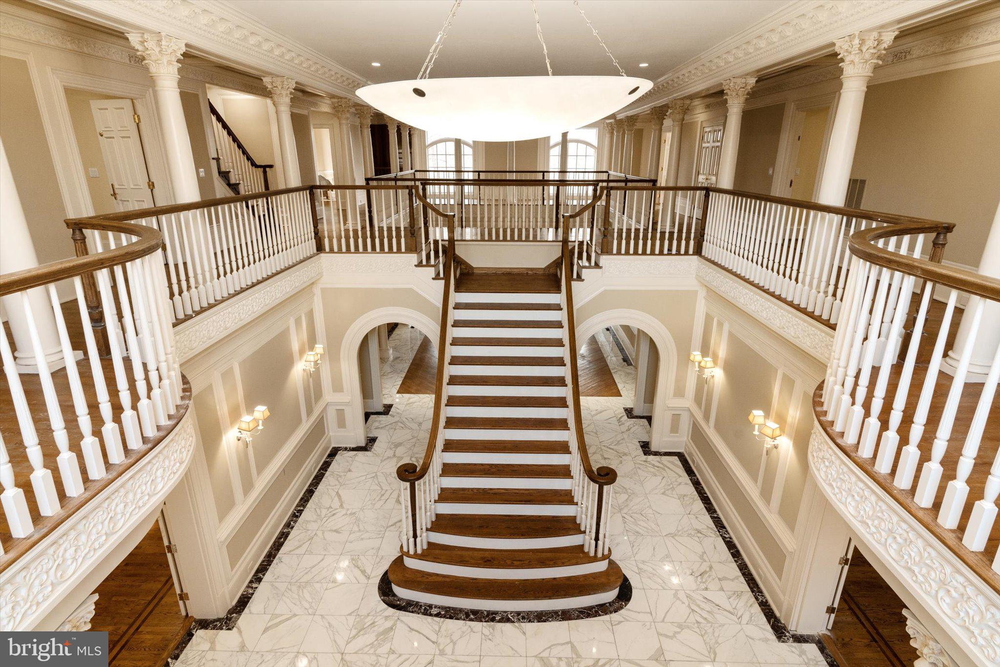 Once owned by the Saudi Royal Family, this distinguished Washington D.C. area estate combines royal heritage with timeless elegance. Situated on over three secluded acres just outside Washington, D.C., this palatial residence offers a rare opportunity to own a piece of regal history. Priced nearly $1 million below its tax-assessed value - this presents an exceptional opportunity.

A long, gated driveway leads to this stately home, surrounded by lush, mature landscaping that provides unmatched peace and serenity. Inside, the grand foyer welcomes you with a sweeping staircase and soaring ceilings, evoking the charm and splendor of a fairytale castle. Designed for both everyday luxury and large-scale entertaining, the home features a four-car garage, an elevator servicing all four levels, and five fireplaces that bring warmth and sophistication throughout. A residential and a commercial kitchen make hosting effortless, while wet bars on the main and lower levels provide convenience and style for gatherings. The property also includes a private theater room for cinematic experiences, along with an indoor jacuzzi room and sauna offering spa-like relaxation. While updates and repairs are needed, they present the perfect opportunity to infuse your own vision into this one-of-a-kind property. With its royal provenance, expansive grounds, and luxurious amenities, this estate offers unparalleled potential and prestige. This is truly a rare chance to own an estate once fit for a king. Contact the listing agent today for a private showing.