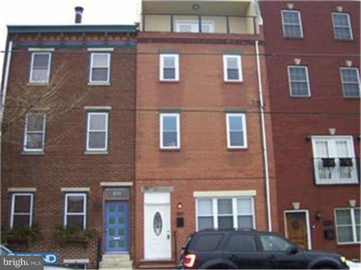 Northern Liberties Big 3 story home 4 bedrooms 2 full baths and 1 half bath. Hardwood floors, Stainless steel appliances, granite counter top. Large yard Semi finished basement. Top floor roof deck and front balcony. This home is also for sale. Just fully rehabbed!