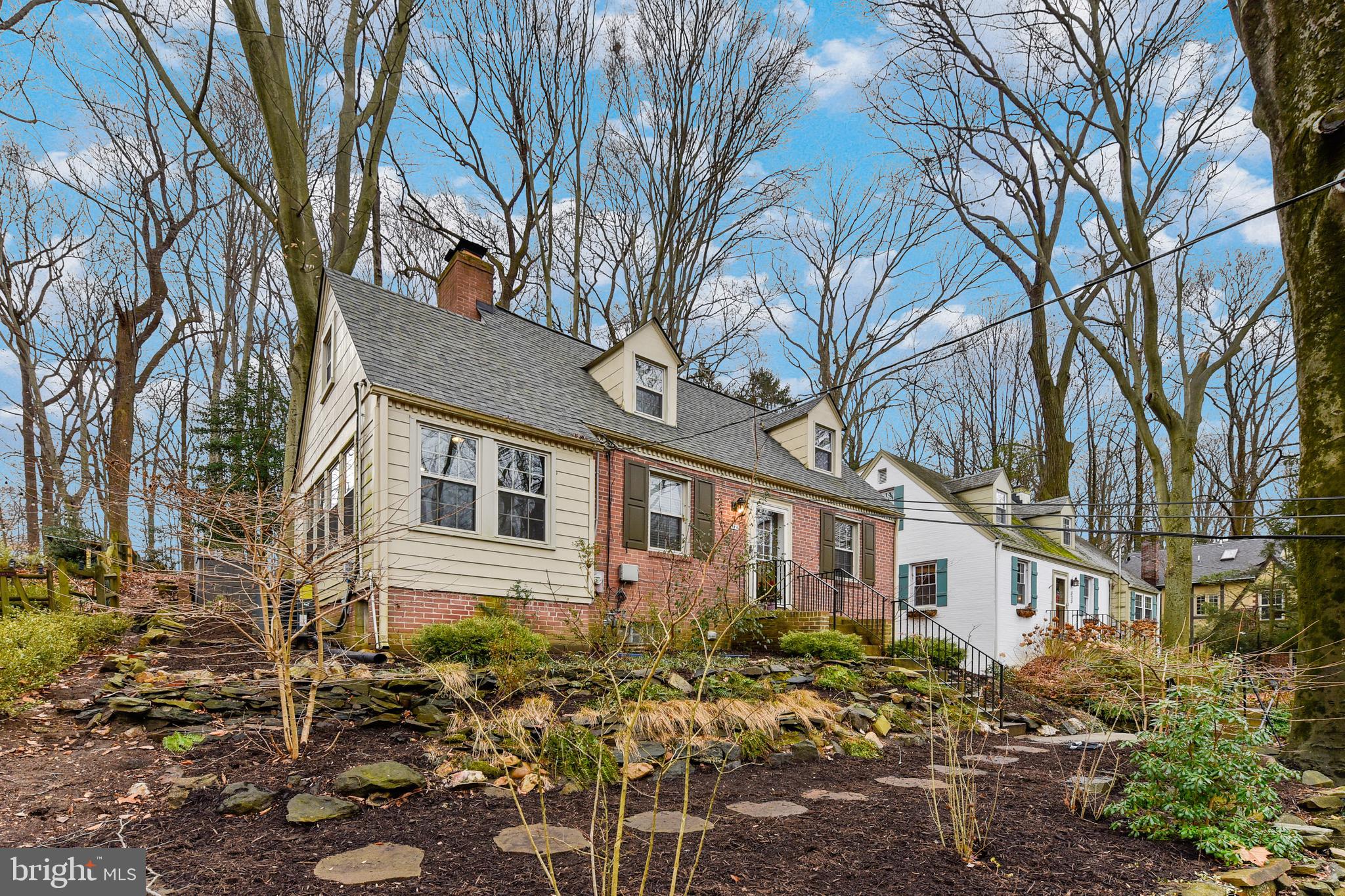 Welcome to 316 Mississippi Ave, a charming and private retreat nestled in the desirable neighborhood of Sligo Park Hills, perfectly situated between Downtown Silver Spring and Takoma Park. As you approach the home, you'll be struck by the beautiful tiered garden with a stone walkway that leads to the front door. The tree-lined streets and peaceful atmosphere make this area a true gem while still maintaining close and convenient proximity to walking/biking trails, parks, Main Street Takoma, Downtown Silver Spring, and Washington DC.

As you step inside, you'll be welcomed by the warm and inviting layout of the home. The main level features hardwood floors and living spaces filled with natural light. The well-appointed kitchen is perfect for home cooks touting granite countertops, stainless steel appliances, and under-cabinet lighting. The wood-burning fireplace in the living room adds an extra level of charm and coziness. Step down from the living room into the sunroom to soak up additional rays! Perfect as a play-room, office space, breakfast area, etc, configure this room to your heart’s desire! 
 
With hardwood floors throughout, you'll find the upstairs level to be just as inviting and comfortable. The owner’s suite is a peaceful retreat showcasing a beautiful view of the trees and walk-in closet with exposed brick wall. The full bathroom boasts a freshly updated vanity and brand new tile flooring.The spacious second bedroom boasts plenty of natural lighting and ample closet space.
 
Walk into the basement to discover utility and luxury! The finished space of the basement reveals a large third bedroom/office space with its own private walk out and full bathroom. Styled with a walk in shower and updated vanity, the full bathroom is a treat to guests and household members alike. The unfinished section of the basement is clean, dry, perfect for storage, and provides easy access for maintenance of the home’s major systems.
 
Last but certainly not least is the plentiful outdoor space behind the home. Entertain your guests with confidence as your backyard boasts an expansive well lit patio surrounded by views of the forest. This rare opportunity offers the perfect level of privacy and seclusion while still maintaining unbeatable proximity to metro access and downtown areas.

316 Mississippi Ave is your ticket to comfort, unbeatable location, and serenity . Don't miss your chance to make this lovely home yours!