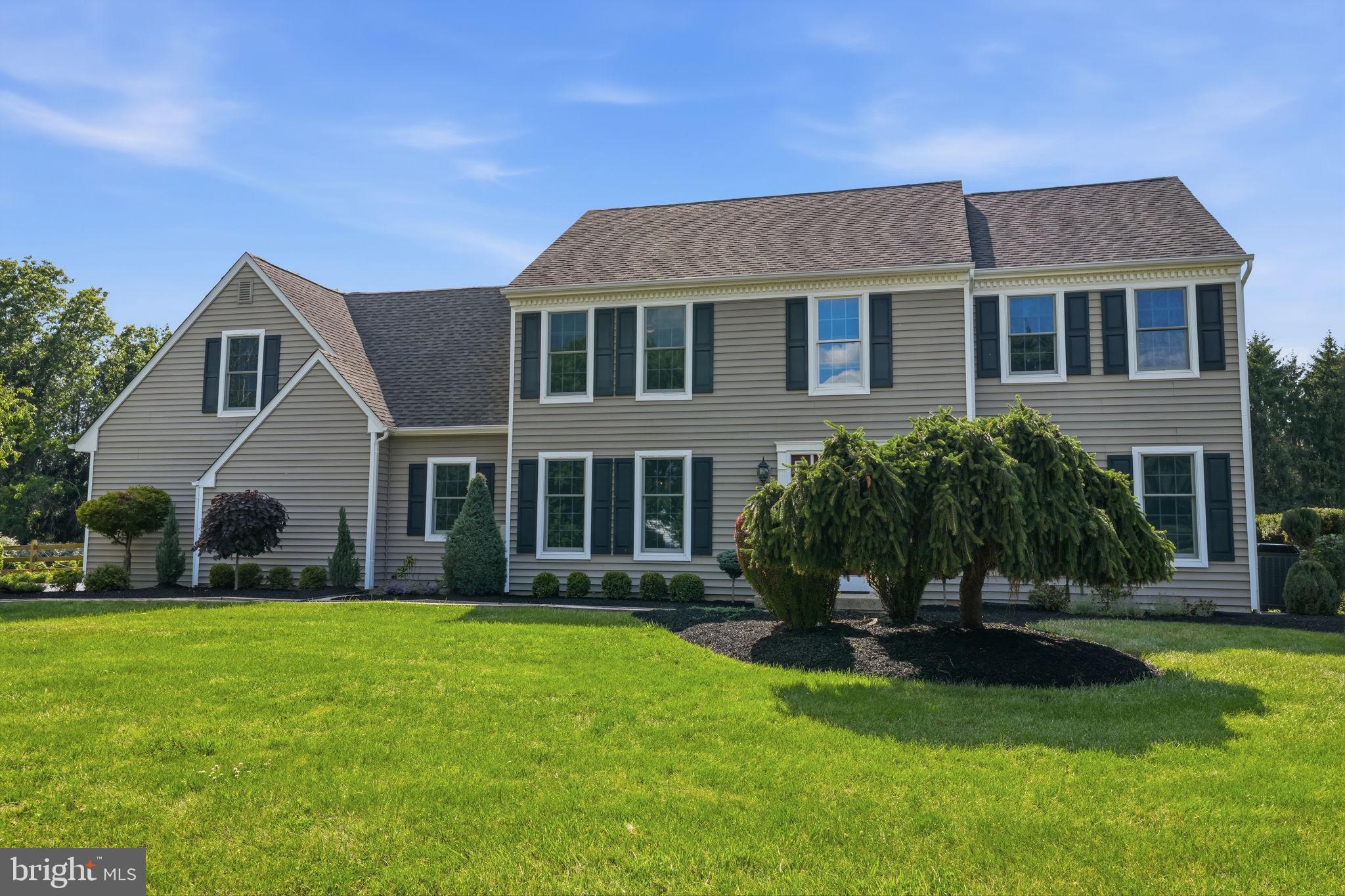 Welcome to this beautifully maintained 4-bedroom, 2½-bath Center Hall Colonial, ideally situated on a private 1.3-acre cul-de-sac lot. Offering a perfect blend of elegance, comfort, and outdoor living, this home features a glamorous in-ground swimming pool surrounded by a new split-rail fence and serene, park-like grounds.
A dramatic two-story foyer welcomes you into the home, where hardwood flooring flows throughout the main level. Extensive decorative moldings, including crown molding, chair rail, and picture frame molding, add timeless architectural detail. French doors open to a private office with recessed lighting, while the formal dining room provides an elegant setting for entertaining.
The well-appointed kitchen features white cabinetry, granite countertops, tiled backsplash, center island, stainless steel appliances, recessed lighting, a convenient beverage center, and a spacious breakfast area. Sliding door access leads to a rear deck overlooking the pool and peaceful backyard setting. The adjacent family room showcases a cathedral ceiling and a wood-burning fireplace with brick surround, creating a warm and inviting gathering space. A first-floor laundry room adds everyday convenience.
The spacious primary suite offers a vaulted ceiling with skylight, filling the room with natural light. Additional highlights include a sitting area, abundant closet space, and an oversized private bathroom. Three additional generously sized bedrooms share a well-appointed hall bath.
The finished lower level provides valuable additional living space, ideal for a recreation room, media room, fitness area, playroom, home office, or a combination of uses, while still offering ample storage.
Completing this exceptional property is a three-car garage and a desirable cul-de-sac location offering privacy, space, and a tranquil setting.
Local residents enjoy an exceptional blend of outdoor recreation, dining, shopping, and historic charm. Just minutes away, Washington Crossing Historic Park offers scenic walking trails, river views, picnic areas, historic sites, and access to the Delaware Canal Towpath for walking, running, and cycling. Nearby outdoor destinations also include Bowman's Hill Wildflower Preserve and the Delaware River recreation corridor. 
In addition, dining options are plentiful and nearby favorites can be found in Newtown, Yardley, and New Hope, providing a wide variety of upscale dining, casual eateries, cafés, and pubs. 
Shopping opportunities are equally impressive. Residents are just a short drive from the boutiques, specialty shops, restaurants, and seasonal events at Peddler's Village in Lahaska. Charming downtown Newtown and Yardley offer unique local shops, galleries, and services, while nearby Princeton provides additional upscale shopping and dining destinations. 
This highly desirable Washington Crossing location combines the tranquility of Bucks County with convenient access to recreation, fine dining, boutique shopping, cultural attractions, and the historic villages of Newtown, Yardley, New Hope, Lambertville, and Princeton.