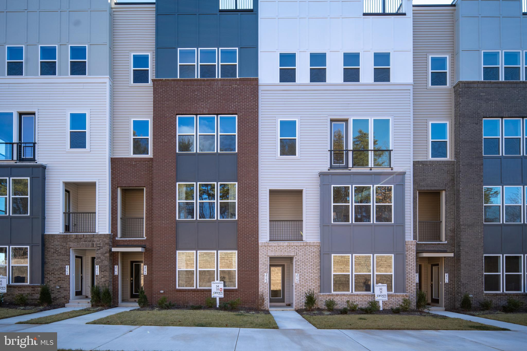 *IMMEDIATE DELIVERY WITH ROOFTOP TERRACE AND COURTYARD VIEW*

Welcome home to this beautifully designed 3-bedroom, townhome-style condo where modern style meets everyday comfort. Warm, inviting, and easy to love, this is a place where life simply feels better.
From the moment you step inside, you’re welcomed by a bright, open layout that feels both comfortable and contemporary—perfect for quiet evenings at home or gathering with the people who matter most.

The open-concept main level creates a natural flow between the living area, dining space, and home office nook, making everyday living effortless. At the heart of it all, the kitchen shines with white shaker cabinetry, quartz countertops, and stainless-steel appliances—an ideal setting for everything from busy mornings to memorable dinners.

Step outside to your private terrace—an inviting spot for morning coffee, fresh air, or relaxing at the end of the day. Upstairs, the spacious loft offers endless flexibility, whether you envision a cozy retreat, media room, or inspiring work-from-home space.

With two additional bedrooms, a spacious primary suite with a large walk-in closet, upstairs laundry, and a 1-car garage, this home offers the space and convenience to truly settle in and enjoy. It’s the kind of place that feels welcoming from day one—and ready to be yours.