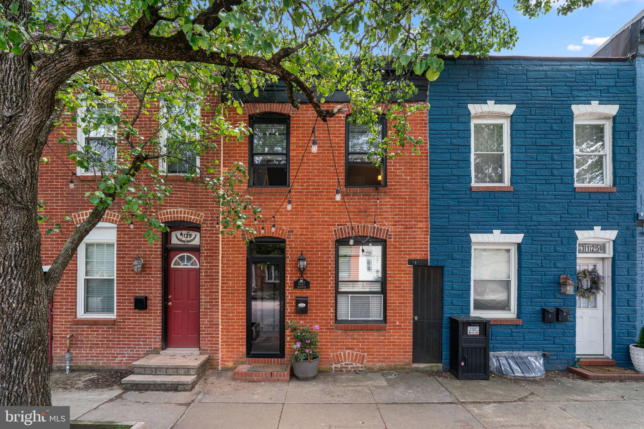Location, style, and functionality collide to be the perfect house at 3127 Elliott St. Nestled on a tree lined street with plenty of parking in the heart of Canton awaits your dream home! Stepping inside you're immediately wowed by the iconic Baltimore brick wall and the impressive coffered ceiling. The warm and inviting living room, with stunning hardwood floors, is ready for all your entertainment needs and leads back through the dining area to the expansive and updated kitchen. Gorgeous white shaker cabinets and stainless steel appliances make this a stand out dream kitchen perfect for every chef's needs. A handy half bathroom makes this this level have everything you need. Out the back door is a patio ready for entertaining or outdoor storage. The entire house has a built in speaker system as well! The upper level features two enormous bedrooms and bathrooms. The owner's suite is designed for luxury with an en-suite bathroom complete with oversized shower with dual shower heads, a double vanity, a walk in closet, and plenty of space for any size bed you'd like to have in there. The second bedroom is generously sized, features the iconic brick wall, and is right next door to another fully updated bathroom. To keep your life easy, laundry is also located outside the bedrooms. The freshly stained (2026) rooftop deck is a stunning addition to this home. Perfectly suited for entertaining, grilling in the summer evening hours, taking in the views, or just a simple morning coffee. Catch the 4th of July and New Years Eve fireworks from your own rooftop! The lower level is a flex space equipped with a fully updated bathroom with a walk in shower. You can use it as a bedroom with en-suite, an office, a living room, a play room, a music room, or anything else you can imagine. The entire house has been painted top to bottom to make it ready for the next lucky owner! This is an idyllic home in an incredible area of Canton. Just a few blocks from the waterfront park, you can have waterfront views anytime you like. Around the corner you have iconic places like Mamas on the Half-Shell and Cafe Dear Leon, in addition to an endless number of other restaurants and coffee shops to visit. Within a few minutes you have several community sports leagues that meet nearby, including pickleball! 3127 is perfectly situated to be a private retreat in a bustling community. Come fall in love today!