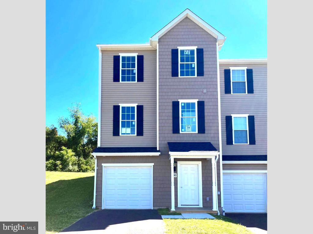 MOVE IN READY EOG TOWNHOME - FREE FINISHED REC ROOM & FULL BATHROOM IN BASEMENT, $15,000 IN CLOSING HELP, FREE REFRIGERATOR, WASHER & DRYER!! Come & see our Quick Delivery townhomes in beautiful Homestead Acres which is just minutes from the Maryland Line & super incentives!!   Our Aberdeen II end of group offers a stylish elevation that can be found in the foyer, family room & 2nd bedroom! This townhome features 3 bedrooms 3.5 baths & a 1 car garage. You will enjoy the open floor plan on the main living area that offers 9 ft ceilings, laminate flooring, powder room, 36" ivory painted kitchen cabinets with crown trim, kitchen island, granite countertops & stainless steal appliances. On the upper floor owner's suite offers double window for the morning sun, private bath, walk-in closet & a 2nd floor laundry. Homestead Acres is close to beautiful Codorus State Park, Long Arm Reservoir & Boat Launch, South Hanover YMCA & South Hills Golf Club. Call Today!   SIMILAR ITERIOR PHOTOS *Incentives through 12/31/23.