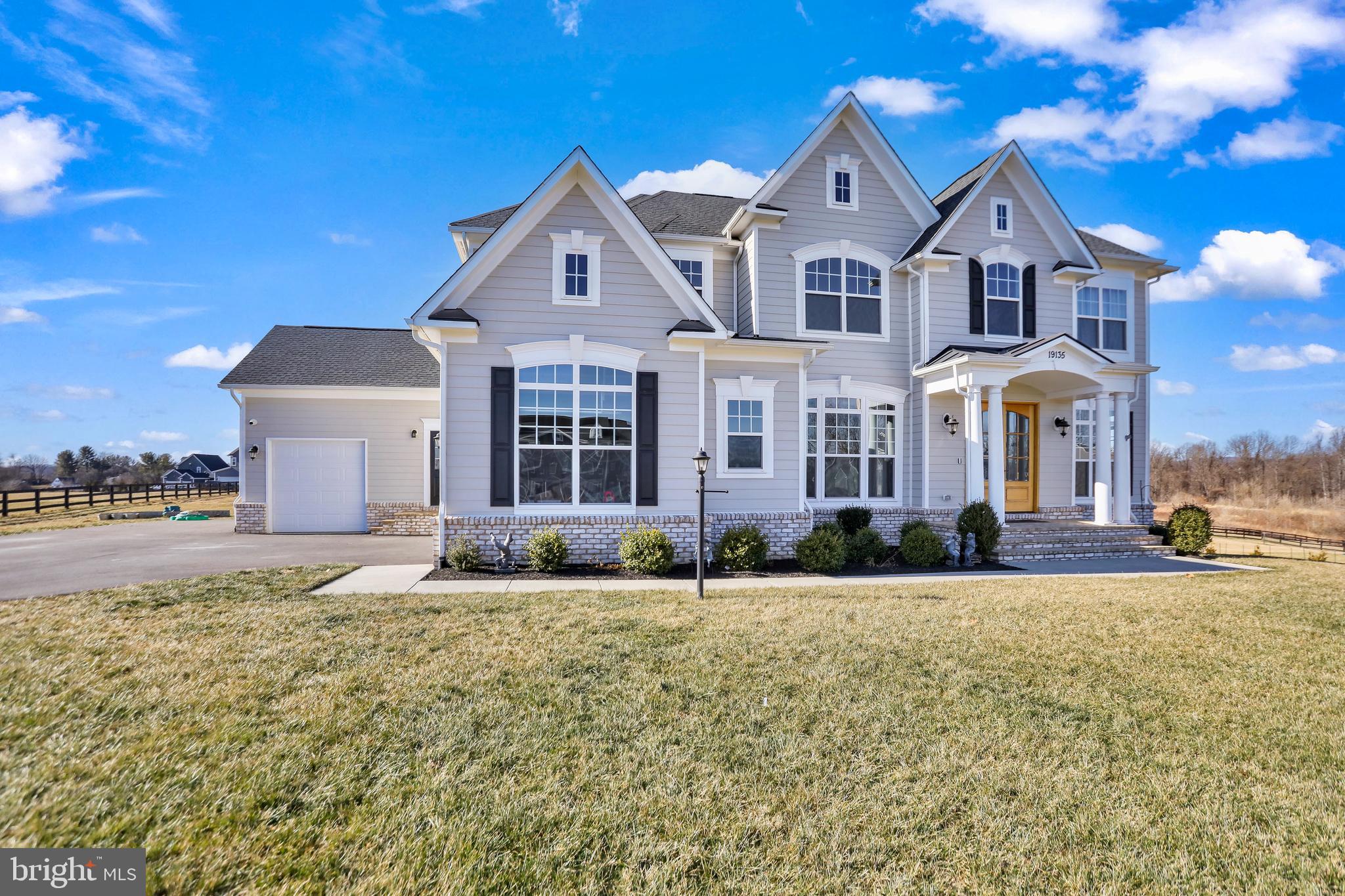 A stunning Huntwick model by Carrington Homes with the coveted Reserve Staircase elevation, set on nearly 2 acres of gently sloping land in the exclusive Hunt Ridge Preserve community of Purcellville, VA. This 2022 built custom masterpiece offers thoughtful upgrades throughout, positioning it as the premier listing in the neighborhood. Enjoy serene views, epic entertaining, and spa-like relaxation, all blending peaceful rural charm with effortless urban access.

Elegant Main Level Living
Over 5,800 sq ft of refined space across three levels, with 10 foot ceilings on the main and upper floors for an open, airy feel. Engineered hardwood floors, cove molding, and coffered ceilings create timeless sophistication. Dual home offices with French doors offer private workspaces, while the gourmet kitchen shines: GE Profile double oven, pot filler, massive 12-foot island with 8-inch overhang for bar seating, and extra windows for abundant natural light. The mudroom features tiled floors, XL coat closet, custom built-ins, and a convenient dog wash station, practical luxury perfected.

Luxurious Upper Level Retreat
The primary suite is a true oasis: engineered hardwood floors, heated bathroom tiles, clawfoot tub, XL shower with dual side by side heads, his and hers walk-in closets with custom organizers, quartz counters, and under-sink outlets for tucked away appliances. Four bedrooms each boast private en-suite with granite countertops and walk-in closets. The oversized laundry room includes cabinets and a sink for effortless daily living.

Versatile & Expansive Basement
Partially finished with a rec room, full bathroom, 9-foot ceilings, rough-in for a bar, and three unfinished spaces, including a potential fifth bedroom with egress window. Perfect for a home gym, media room, or future guest suite, the possibilities are endless.

Premium Modern Upgrades
Enjoy whole-home comforts: central vacuum across all levels, security system with cameras and door alarms, multiple WiFi access points, 240V EV charger in the garage, hot tub hookup, propane for an outdoor kitchen, and Aprilaire whole-house humidifier. The advanced 2023 water treatment system (iron filtration with ozone, resin softener, UV disinfection, and 5-micron pre-filtration) delivers pristine water quality. Capped fan/lights in bedrooms, offices, living, and dining rooms add easy personalization.

Prime Location & Exceptional Lifestyle
Hunt Ridge Preserve provides tranquility with low HOA fees and community trails, minutes from vibrant Purcellville downtown, award-winning dining at Magnolias at the Mill, Catoctin Creek Distillery, W&OD Trail adventures, and farm-fresh markets. Families thrive in top-rated Loudoun County Public Schools: Banneker Elementary (serving the area with strong proficiency scores), Blue Ridge Middle (consistently ranking among Virginia's top middle schools), and Loudoun Valley High, part of a district recognized for excellence in academics.

Commuting is seamless: approximately 49 miles to Washington, DC, about 25 miles to Dulles Airport, and easy access via Route 7. Loudoun County shines as Virginia's crown jewel, home to the nation's leading data center market, dozens of acclaimed wineries, breathtaking Blue Ridge views, and one of the lowest crime rates in Northern Virginia. Here, small town warmth meets big opportunities: farmers' markets, craft breweries, community events, and DC proximity without the hustle.

This isn't just a home, it's your elevated lifestyle gateway in one of America's most desirable counties.

Don't miss this one of a kind gem, schedule your private tour today!