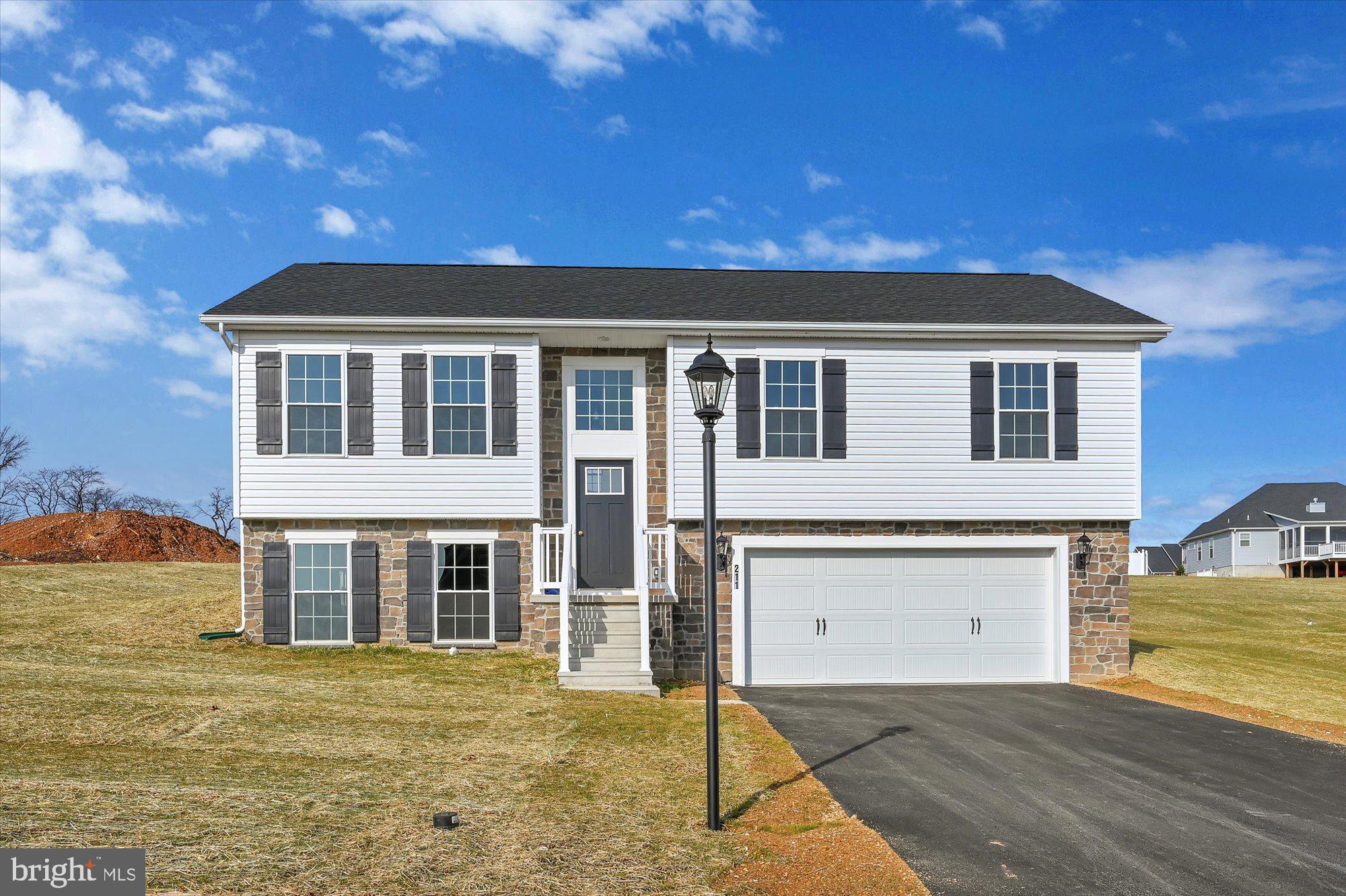This is a TO BE BUILT home listed at the base price. You can choose this model or another model. ##Visit model home/on-site sales office at 2601 Village Rd, Dover PA for more information##
Incentive available with the use of one of our preferred lenders & title co.. 

The split foyer, LIBERTY is perfect for active, growing families or home-based businesses. Everything you need for a comfortable life is included on the main floor, including two full baths and a large eat-in-kitchen with an optional kitchen island.
The lower level can be whatever you want it to be…an office, den, game room, exercise room or a fourth bedroom and of course a laundry, bath, and garage. So versatile, so livable…be sure to check the exterior add on options for the Liberty.
Whether you’re a young family starting out or “empty nesters” scaling down, these smaller homes could be just right for you.
Although their square footage is limited, they display a generous, welcoming spirit and boast many of the architectural features so popular in larger homes.
Both floor plans are practical and well-proportioned, making it easy to alter or adapt to any homeowner’s needs.
The Liberty can be built on your land or choose a homesite in one of our new home communities and live your best life.