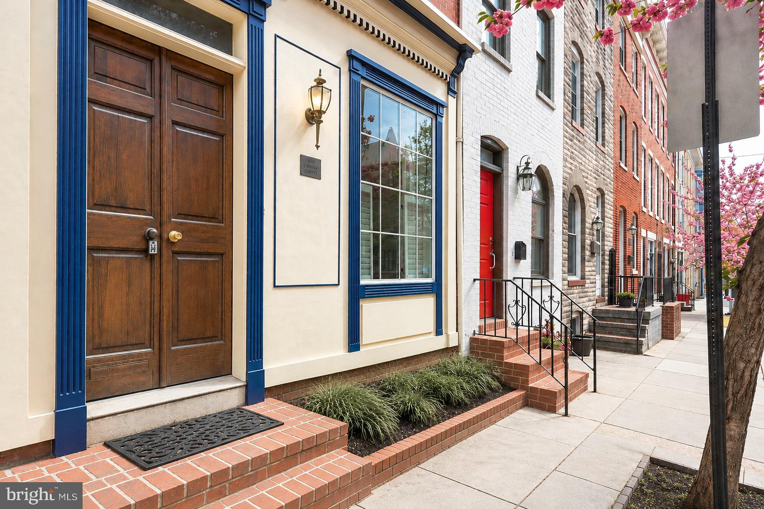Built circa 1880 in the heart of the Historic District, this remarkable home blends timeless character with thoughtful updates. Believed to have once been a neighborhood candy store, the home offers an incredible amount of living space that's nearly impossible to find in historic properties.

The oversized living room is truly a standout, with soaring ceilings and enough room for multiple seating areas, a game table, or even the pool table it once housed. Throughout the home you'll find beautiful original pressed metal trim, exposed brick, warm wood floors, decorative fireplaces, and exposed beams that celebrate its rich history.

The spacious dining room flows into an updated kitchen featuring abundant cabinetry, upgraded countertops, stainless steel appliances, and handsome slate-look flooring. A convenient main-level powder room completes the first floor.

Upstairs, the second level offers two generously sized bedrooms and a full bath. One bedroom is exceptionally large and could easily accommodate a sitting area, office, or creative space. The entire third floor is dedicated to a private primary suite complete with a full bath and laundry, creating the perfect retreat.

Rich in history, filled with original architectural details, and offering a truly impressive amount of living space, this is a rare opportunity to own one of the Historic District's most distinctive homes.  SELLER WILL INCLUDE AN OTTERBEIN SWIM CLUB POOL BOND WITH SALE.